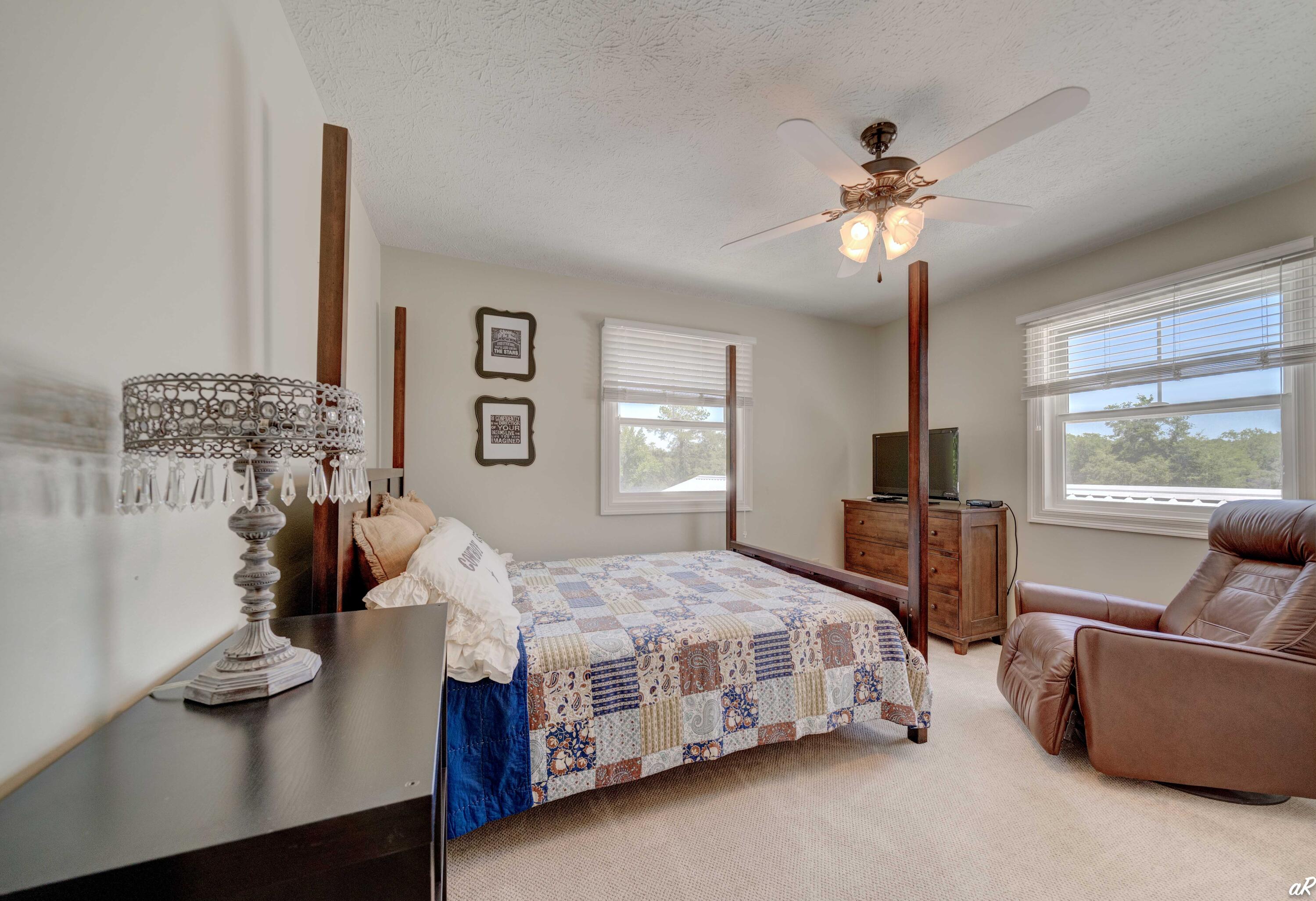 2513 Highway 79 Vernon, FL 32462 - Photo 42 of 85 a bedroom with a bed couch and window