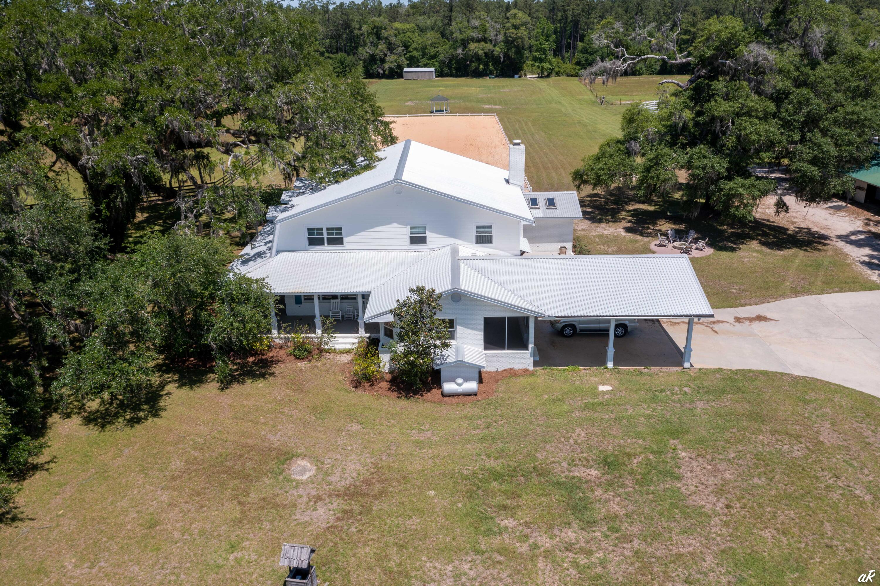 2513 Highway 79 Vernon, FL 32462 - Photo 55 of 85 an aerial view of a house with swimming pool and lake view