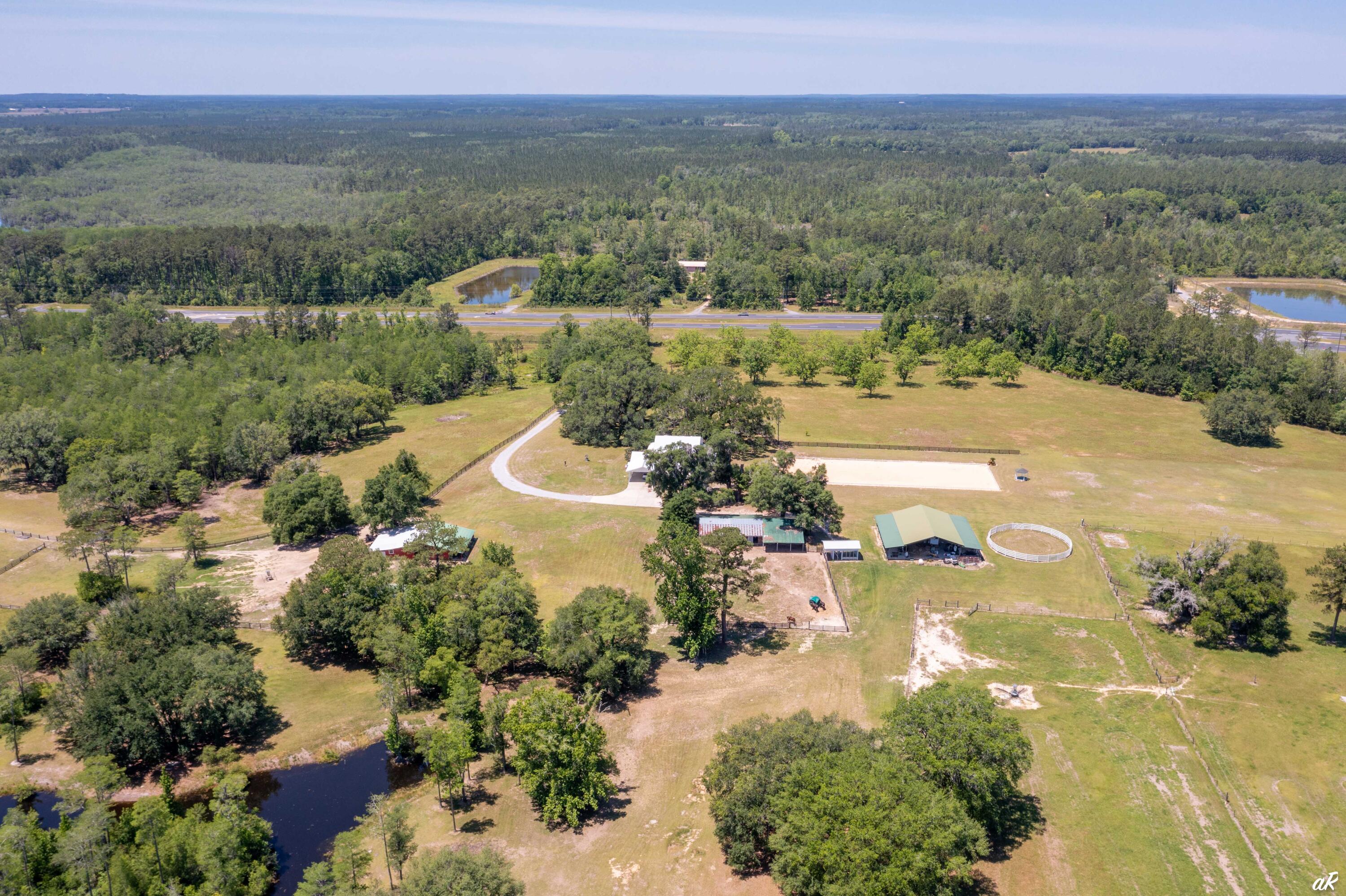2513 Highway 79 Vernon, FL 32462 - Photo 57 of 85 an aerial view of a houses with a yard and lake view