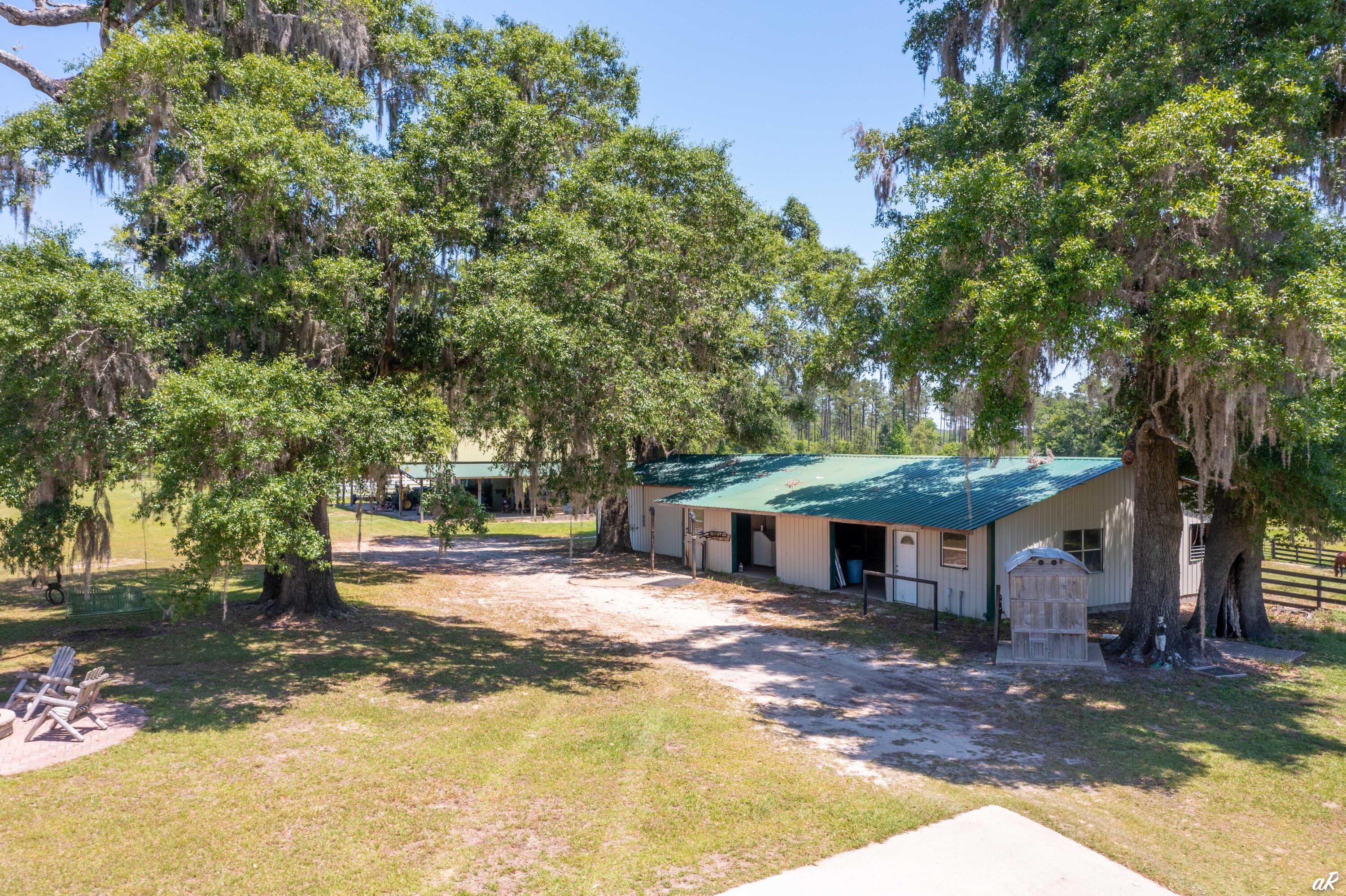 2513 Highway 79 Vernon, FL 32462 - Photo 59 of 85 a front view of a house with a yard