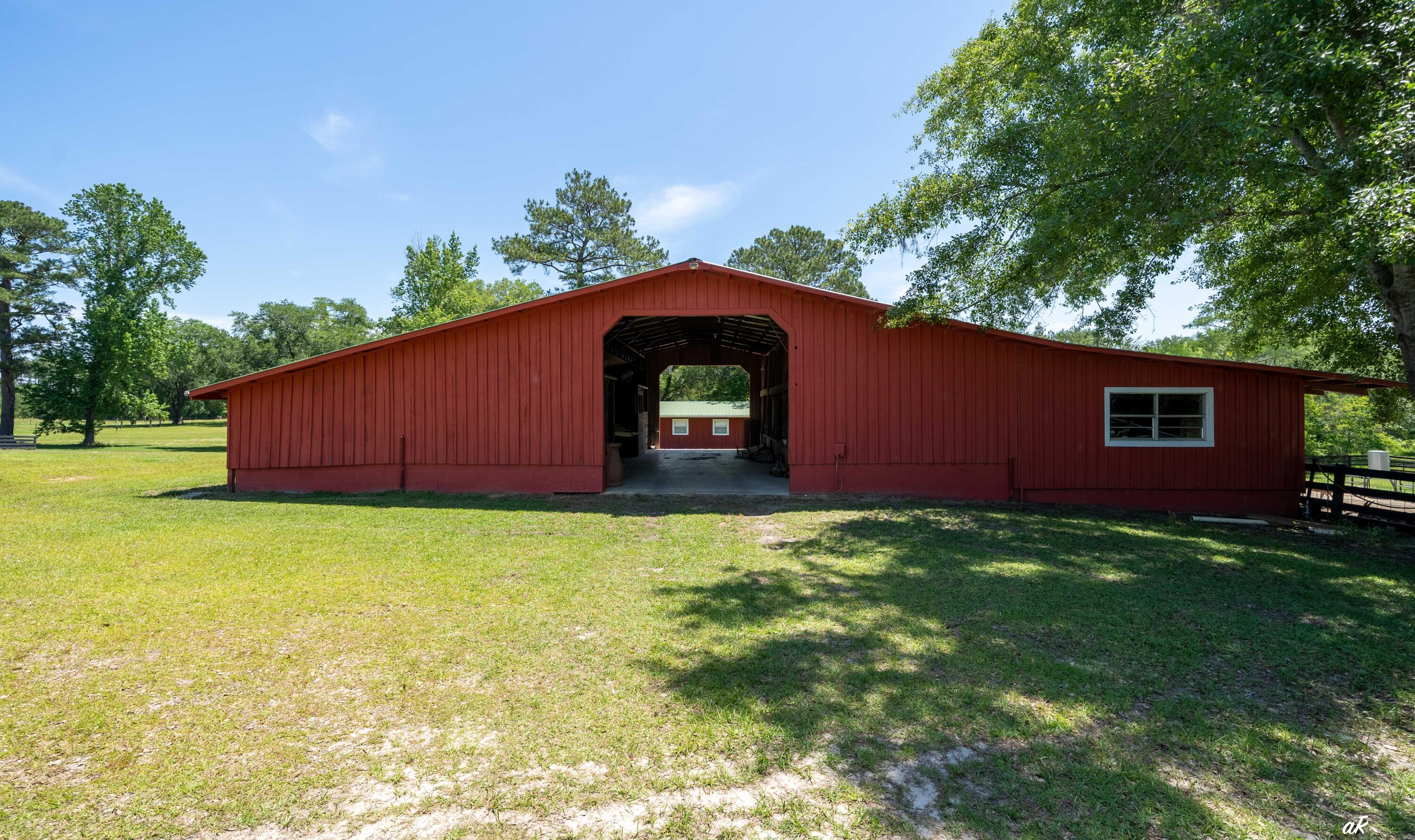 2513 Highway 79 Vernon, FL 32462 - Photo 65 of 85 a backyard of a house with lots of green space