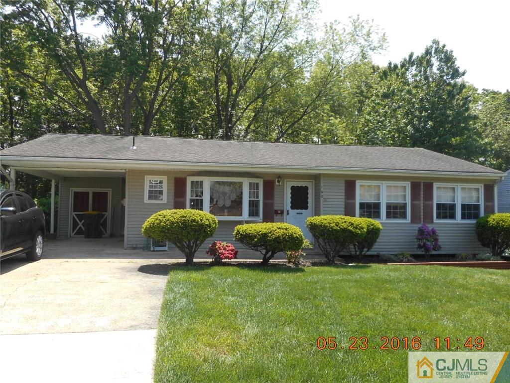 160 Princeton Road Old Bridge, NJ 08859 - Photo 2 of 21 a front view of a house with a yard and porch