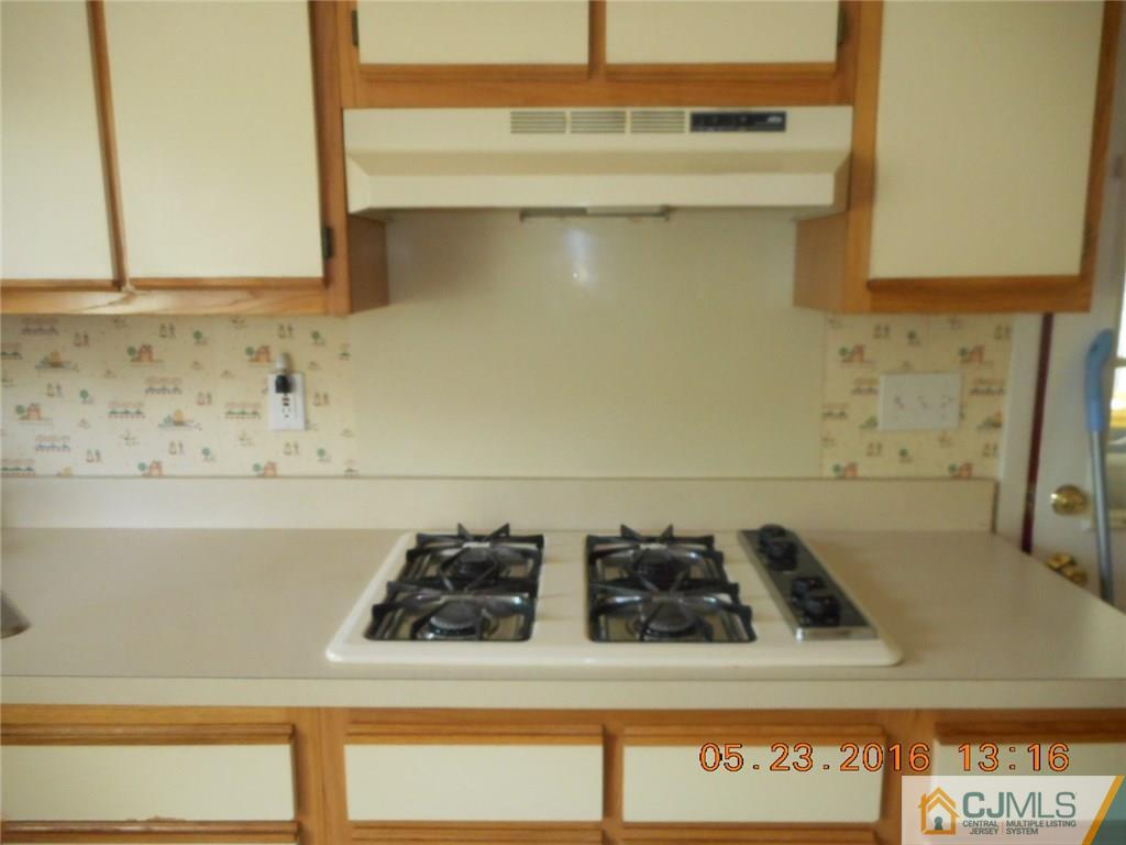 160 Princeton Road Old Bridge, NJ 08859 - Photo 6 of 21 a close view of a sink and a stove
