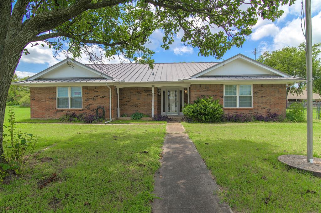 301 East 6th Street Krum, TX 76249 - Photo 1 of 29 Front view of this beautiful brick home on a huge corner lot.