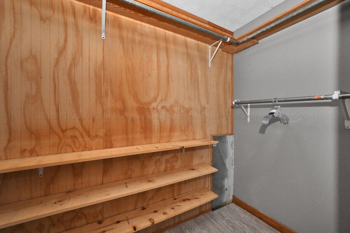 196 County Road 3706 Addison, AL 35540 - Photo 18 of 49 Primary Walk in Closet with Shoe shelves