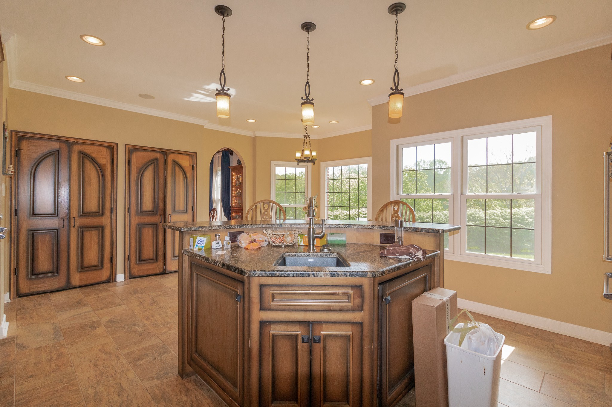 2654 Henry Gower Road Pleasant View, TN 37146 - Photo 20 of 49 a kitchen with center island and stainless steel appliances