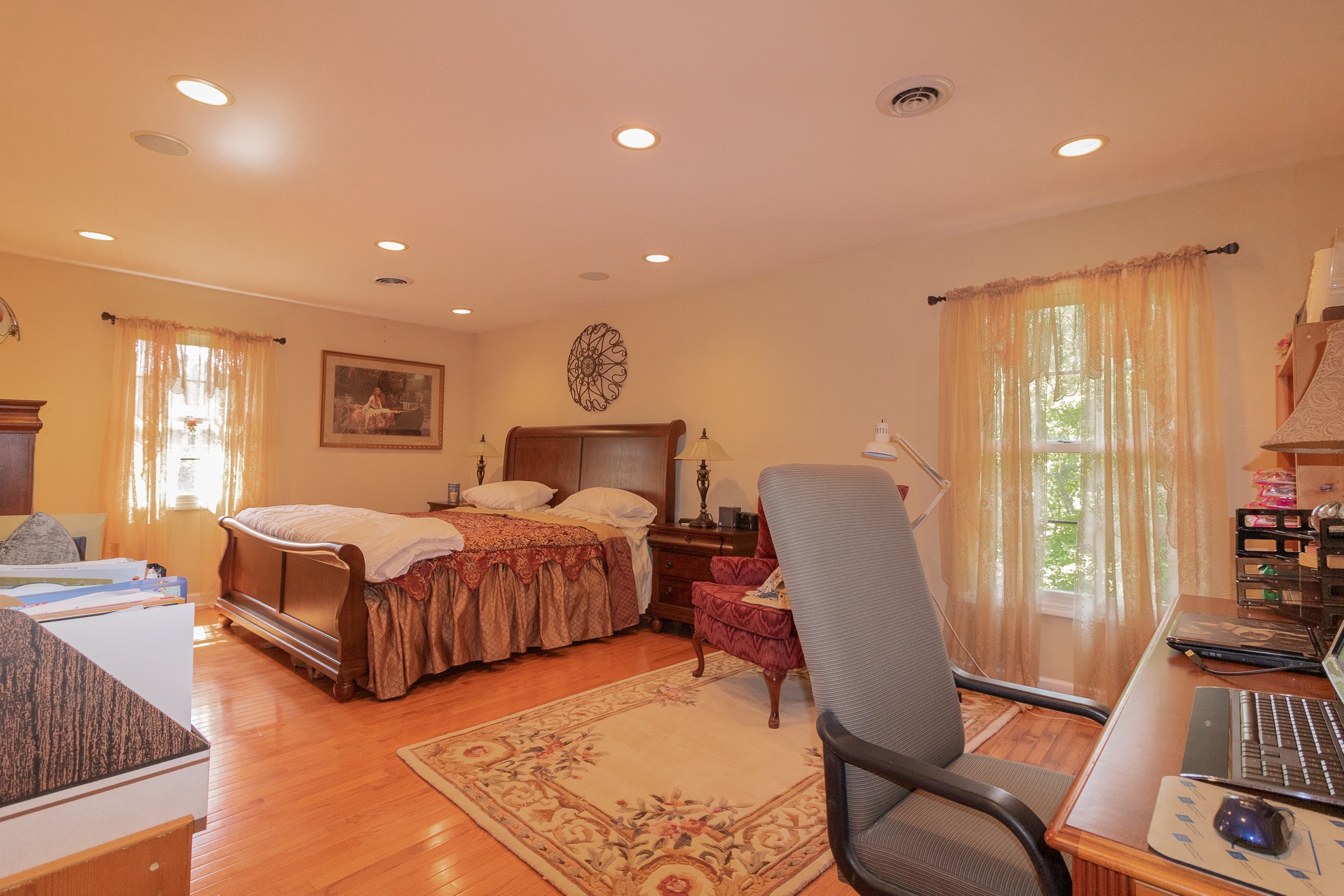 2654 Henry Gower Road Pleasant View, TN 37146 - Photo 25 of 49 a bedroom with a bed and wooden floor