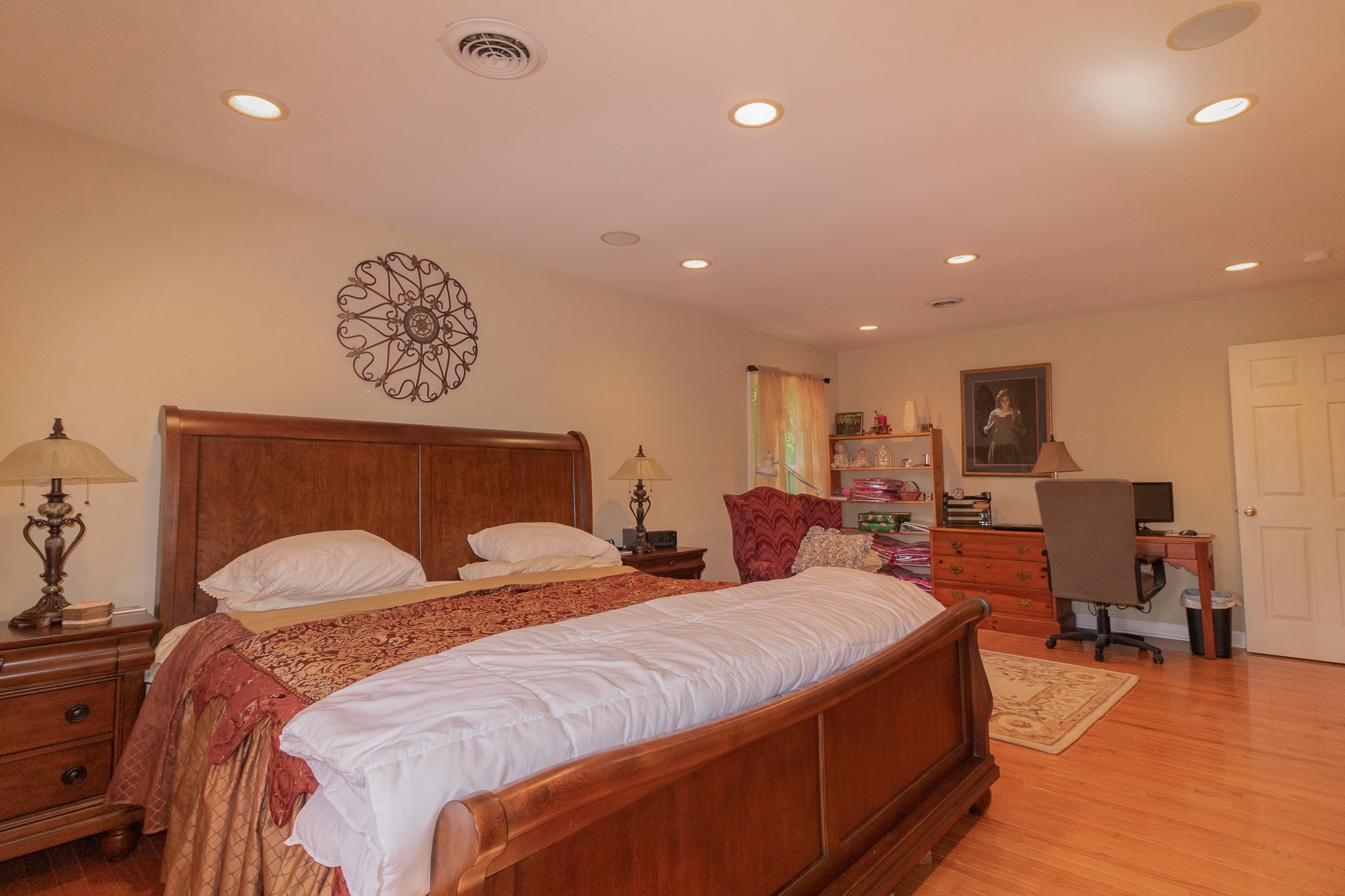 2654 Henry Gower Road Pleasant View, TN 37146 - Photo 26 of 49 a spacious bedroom with two beds and a chair