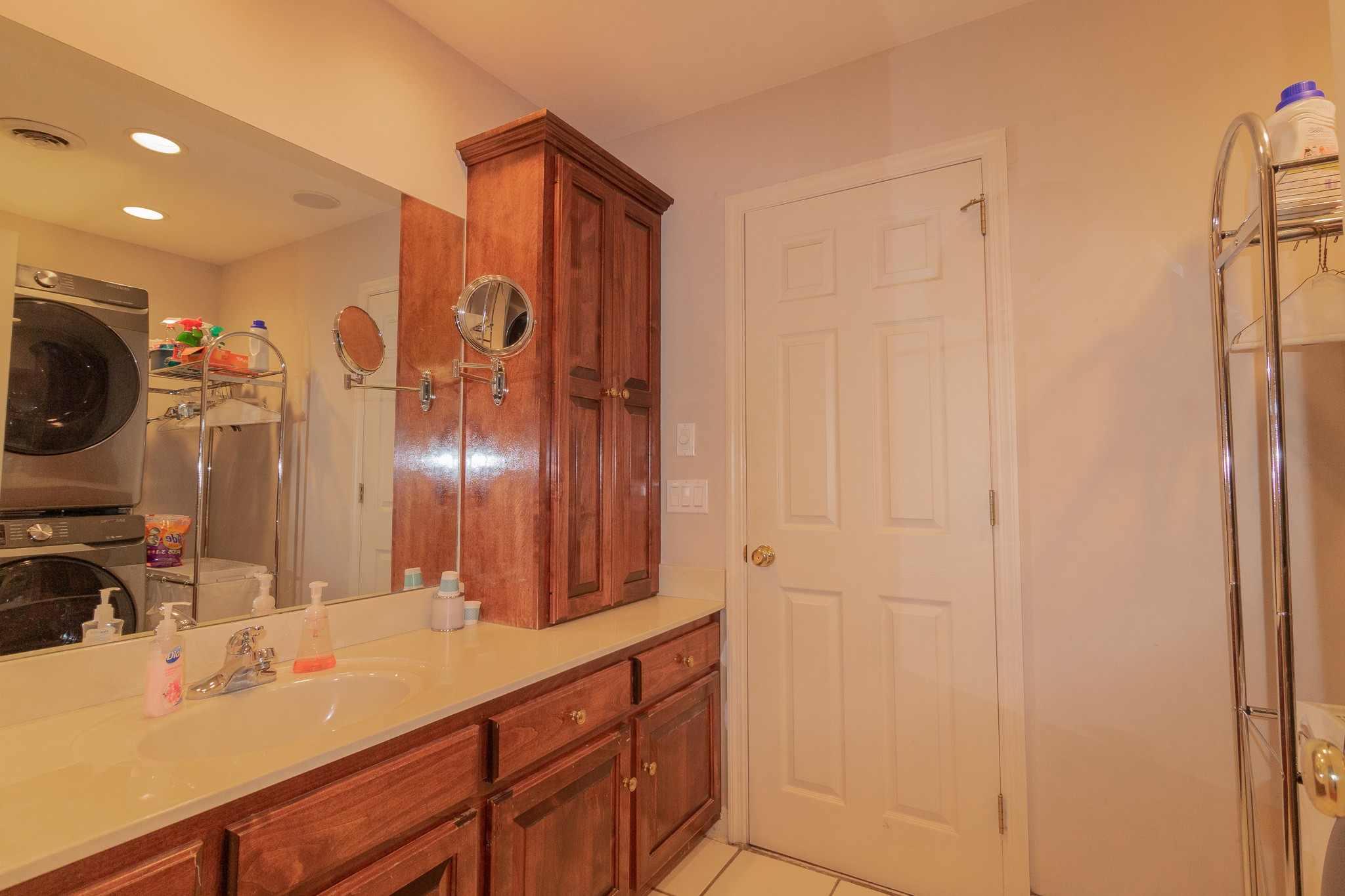 2654 Henry Gower Road Pleasant View, TN 37146 - Photo 27 of 49 a bathroom with double vanity sink and a mirror