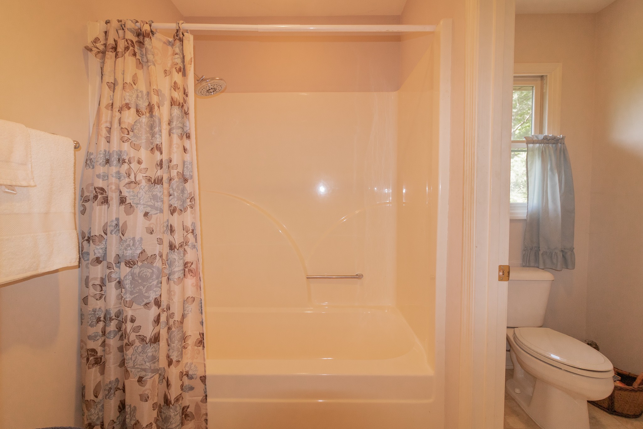 2654 Henry Gower Road Pleasant View, TN 37146 - Photo 28 of 49 a bathroom with a shower curtain