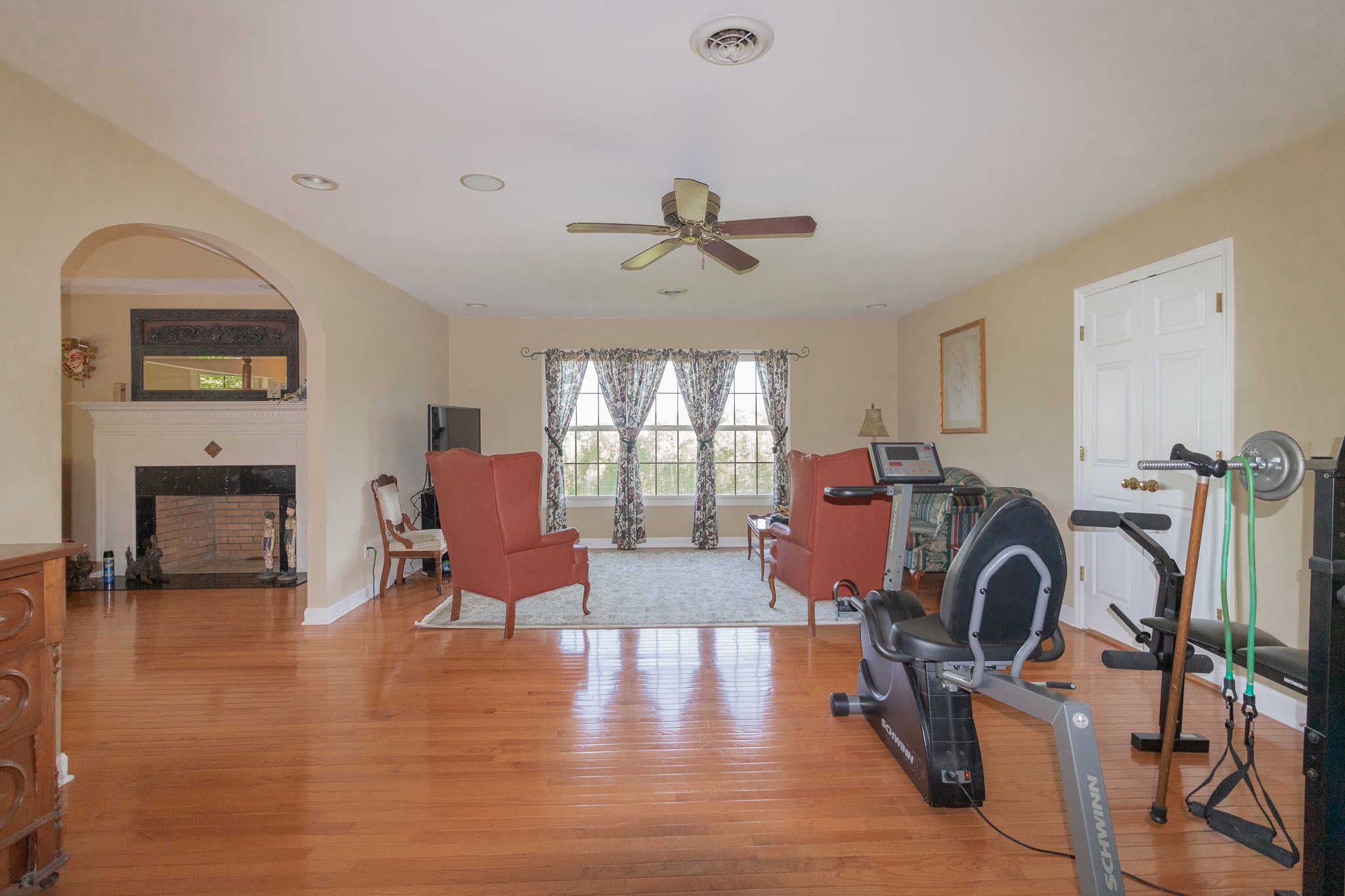 2654 Henry Gower Road Pleasant View, TN 37146 - Photo 30 of 49 a view of a livingroom with furniture and a ceiling fan