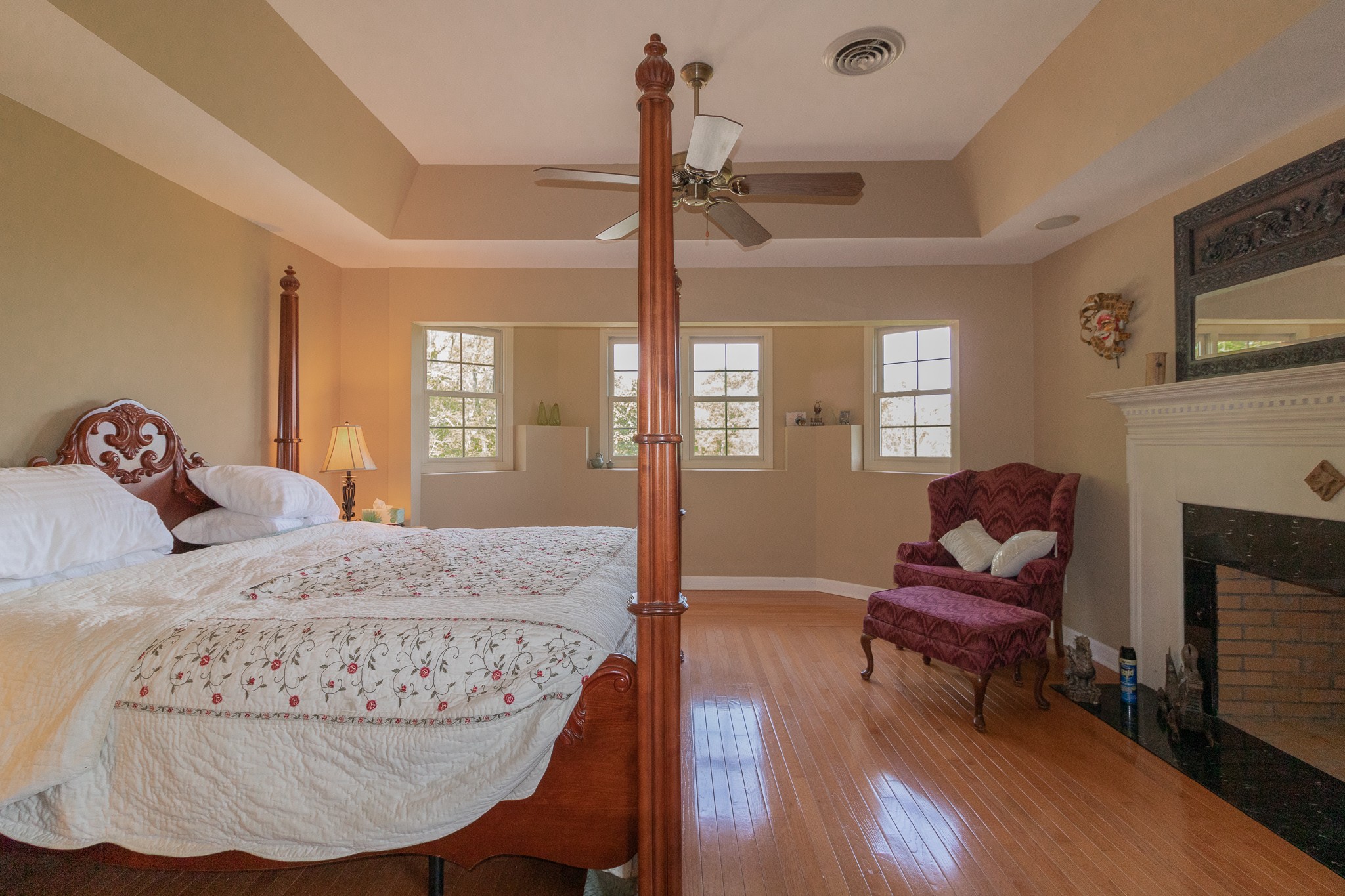 2654 Henry Gower Road Pleasant View, TN 37146 - Photo 32 of 49 a bedroom with furniture and a fireplace