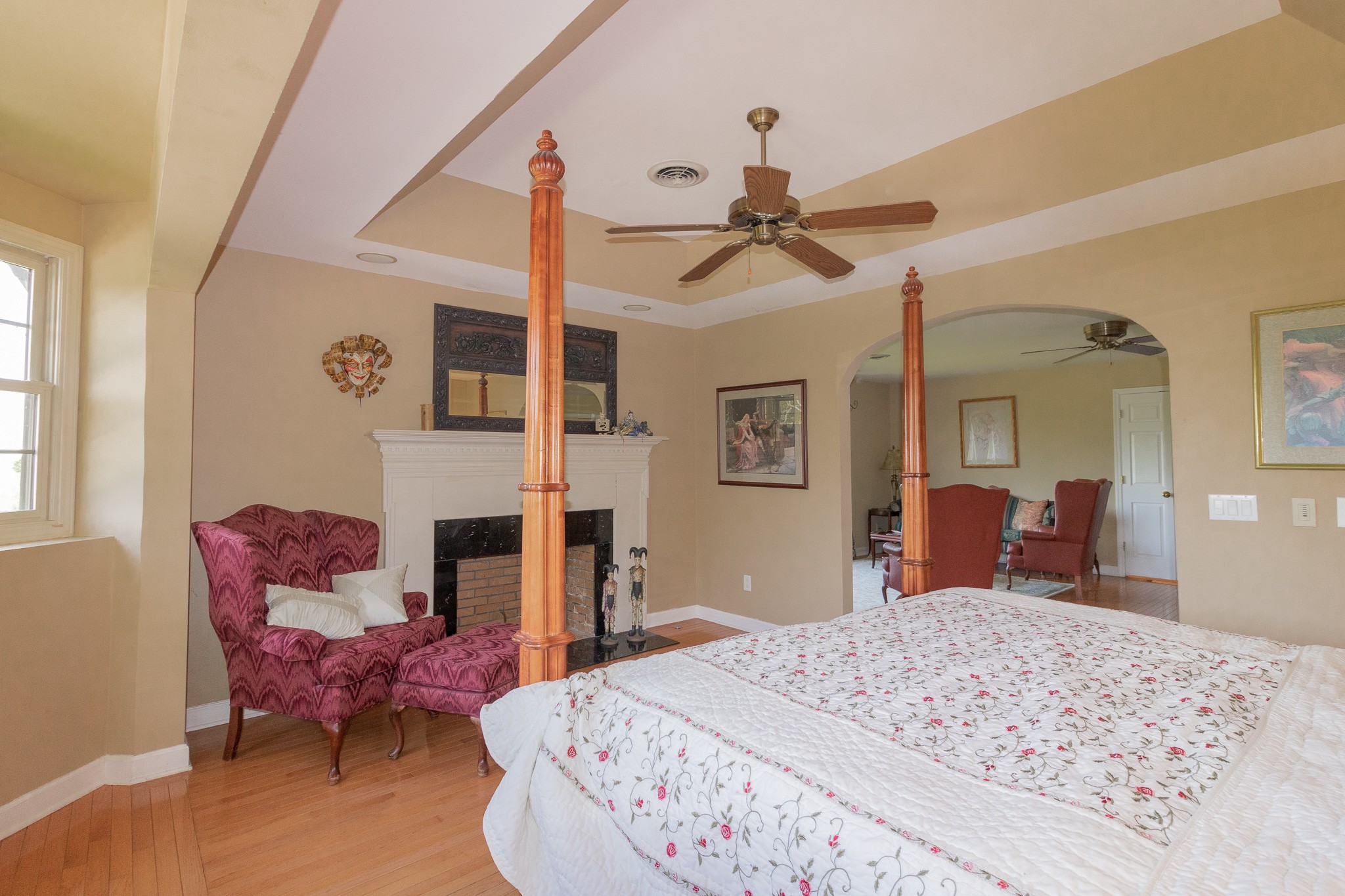 2654 Henry Gower Road Pleasant View, TN 37146 - Photo 35 of 49 a bedroom with a bed dresser and wooden floor
