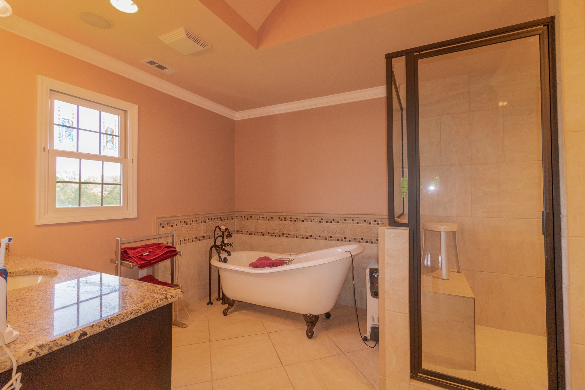 2654 Henry Gower Road Pleasant View, TN 37146 - Photo 36 of 49 a bathroom with a tub sink and mirror