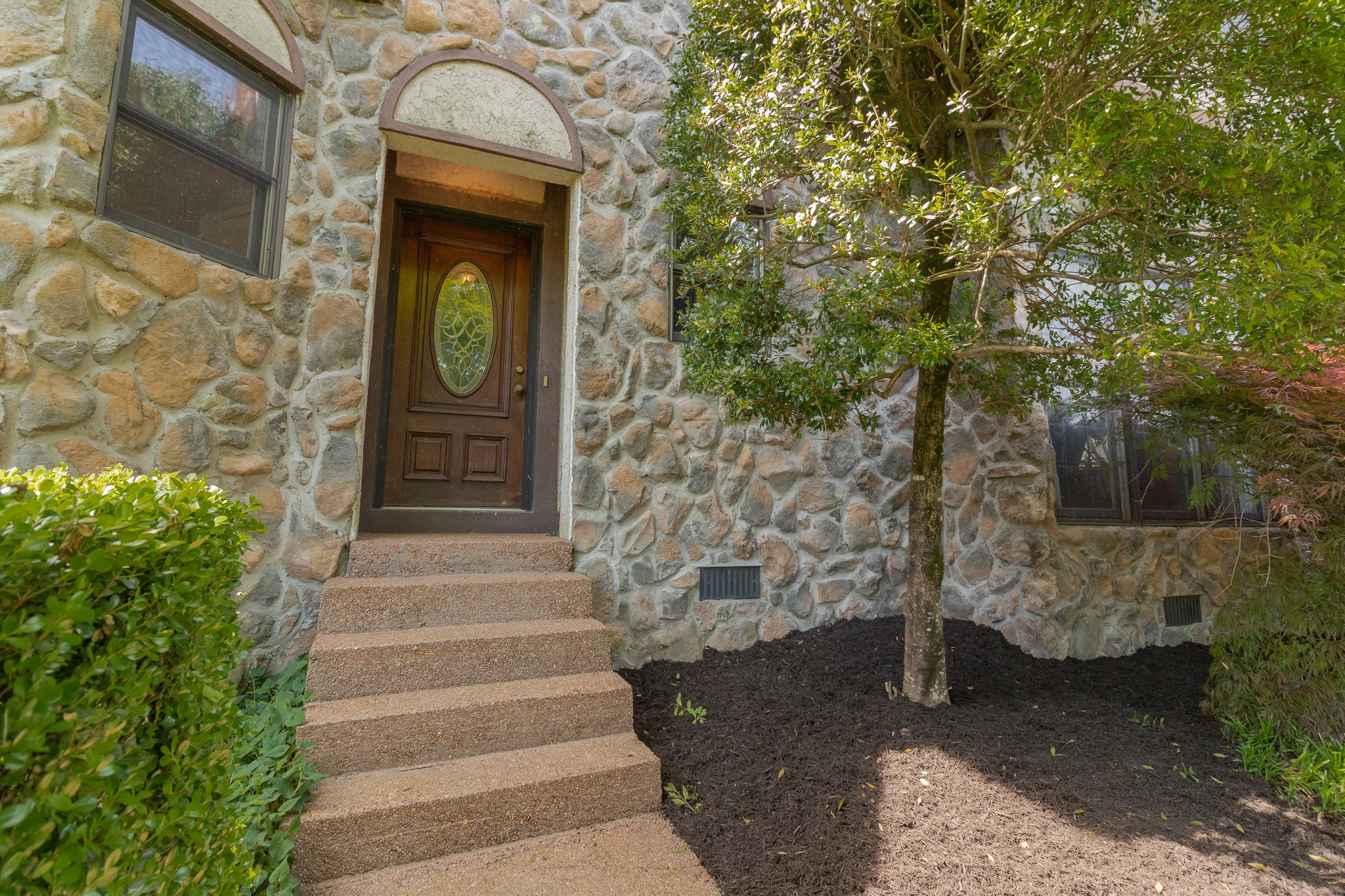 2654 Henry Gower Road Pleasant View, TN 37146 - Photo 6 of 49 a front view of a house with a garden