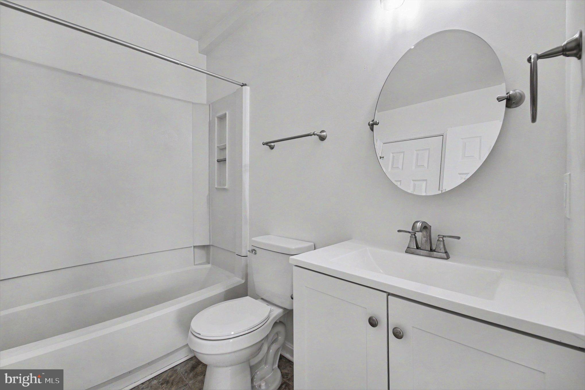 7981 Northumberland Road Springfield, VA 22153 - Photo 12 of 26 Sleek and modern bathroom retreat.