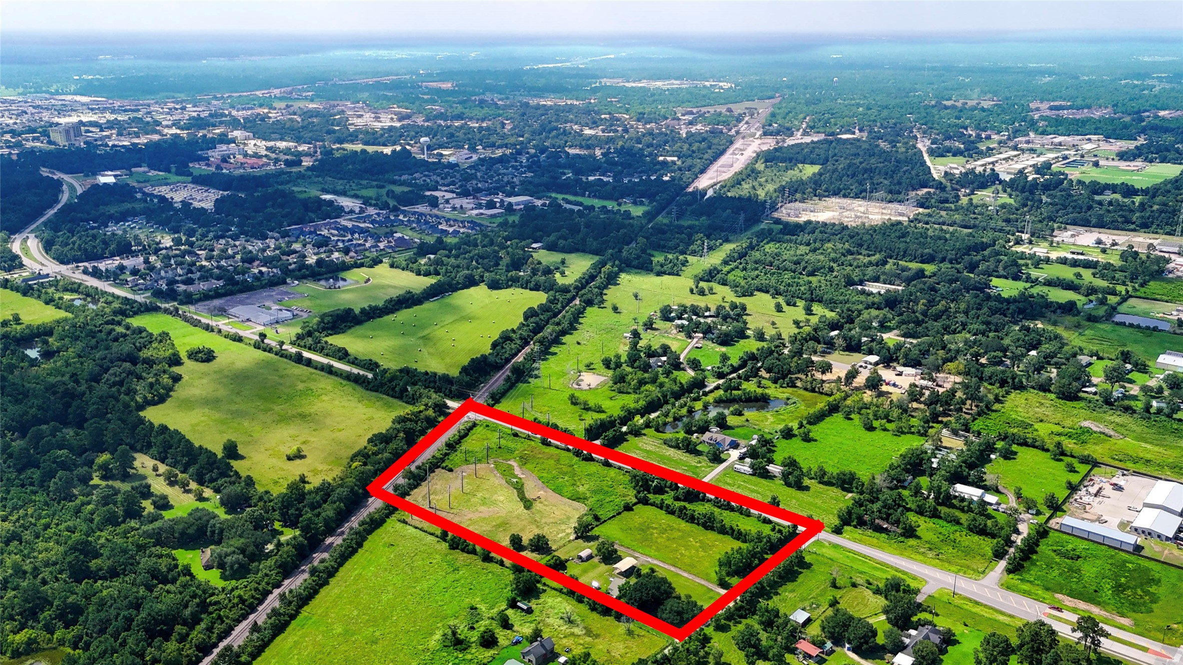 922 Agg Road Tomball, TX 77375 - Photo 15 of 15 an aerial view of a city