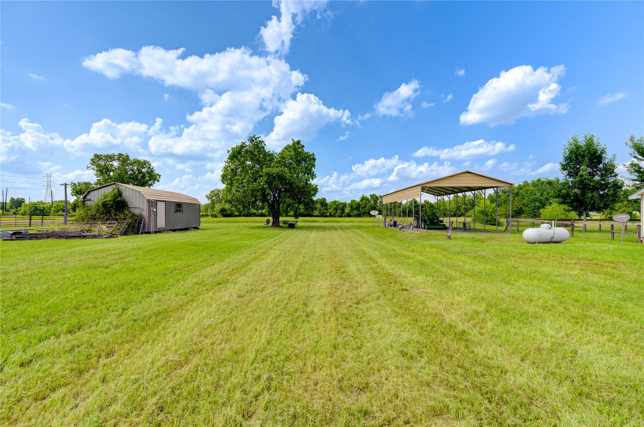 922 Agg Road Tomball, TX 77375 - Photo 10 of 15 a view of yard with swimming pool and green space