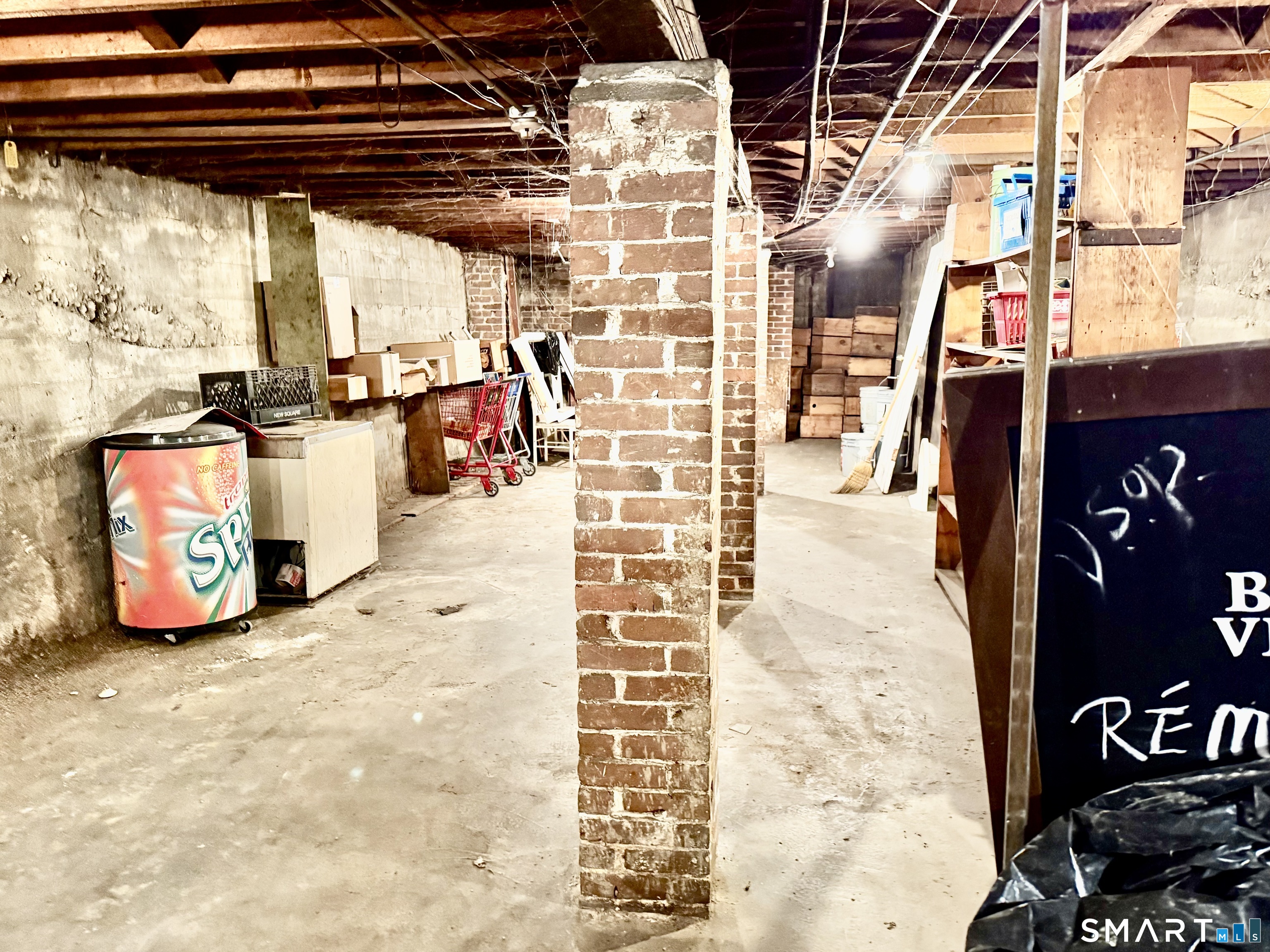 1368-1370 East Main Street Bridgeport, CT 06608 - Photo 10 of 38 Unfinished Basement 2,556 sq ft for storage.