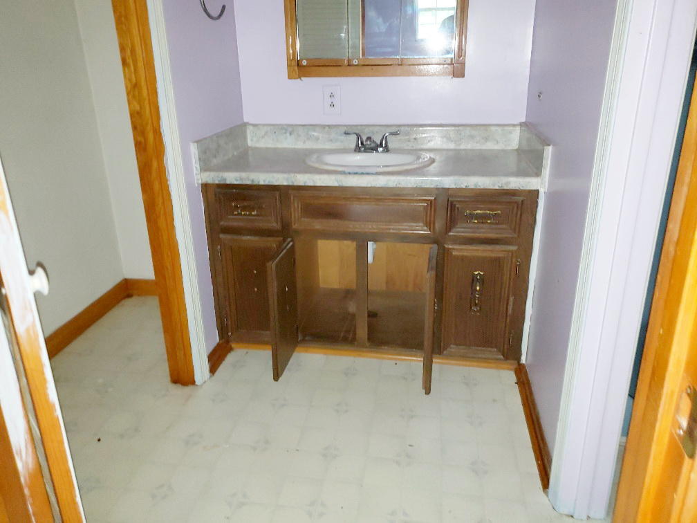 110 Lakeshore Terrace Road Hardy, VA 24101 - Photo 14 of 21 a bathroom with a sink and a mirror