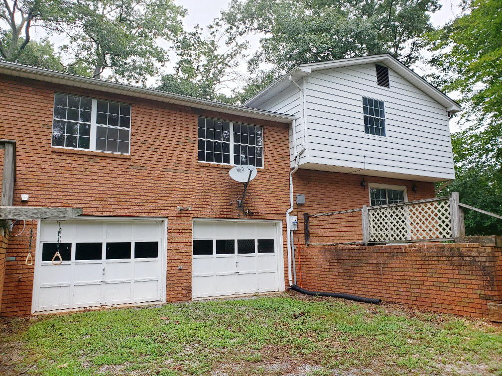 110 Lakeshore Terrace Road Hardy, VA 24101 - Photo 3 of 21 a front view of a house with a yard