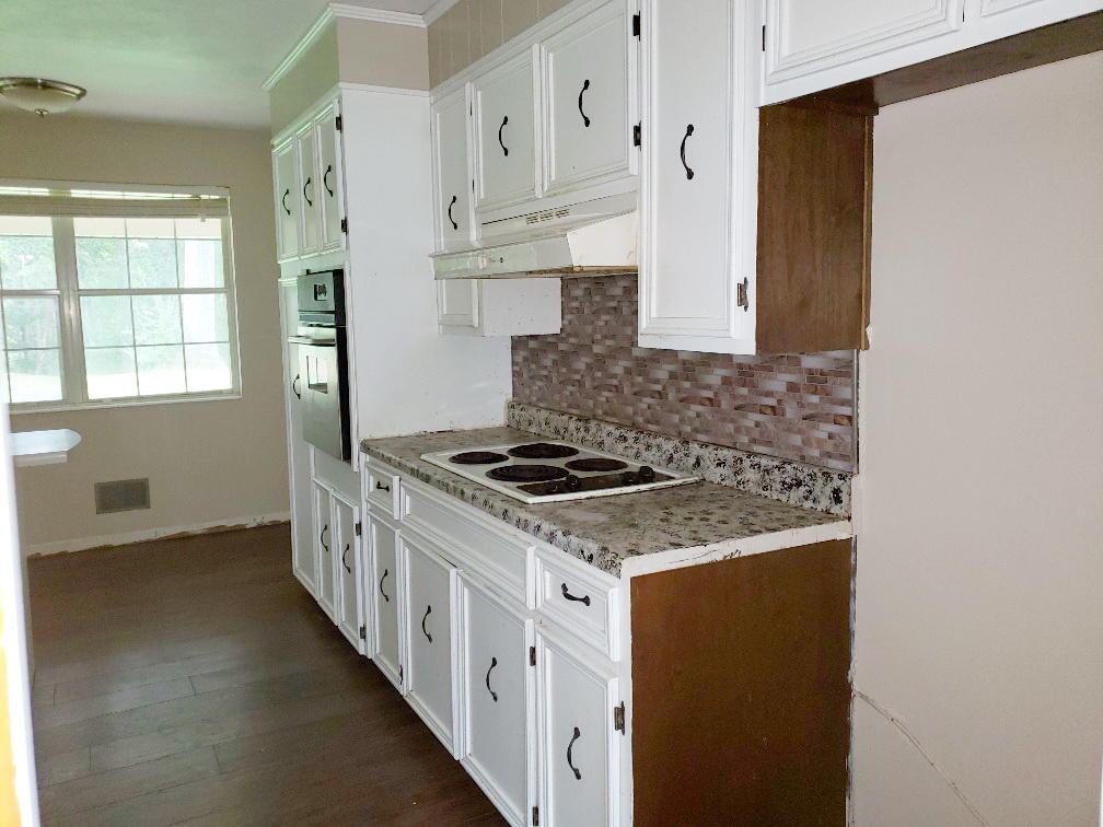 110 Lakeshore Terrace Road Hardy, VA 24101 - Photo 6 of 21 a kitchen with stainless steel appliances granite countertop a stove and a refrigerator