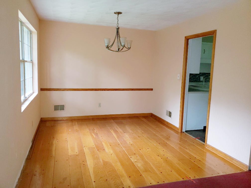 110 Lakeshore Terrace Road Hardy, VA 24101 - Photo 8 of 21 a view of an empty room with wooden floor and a window