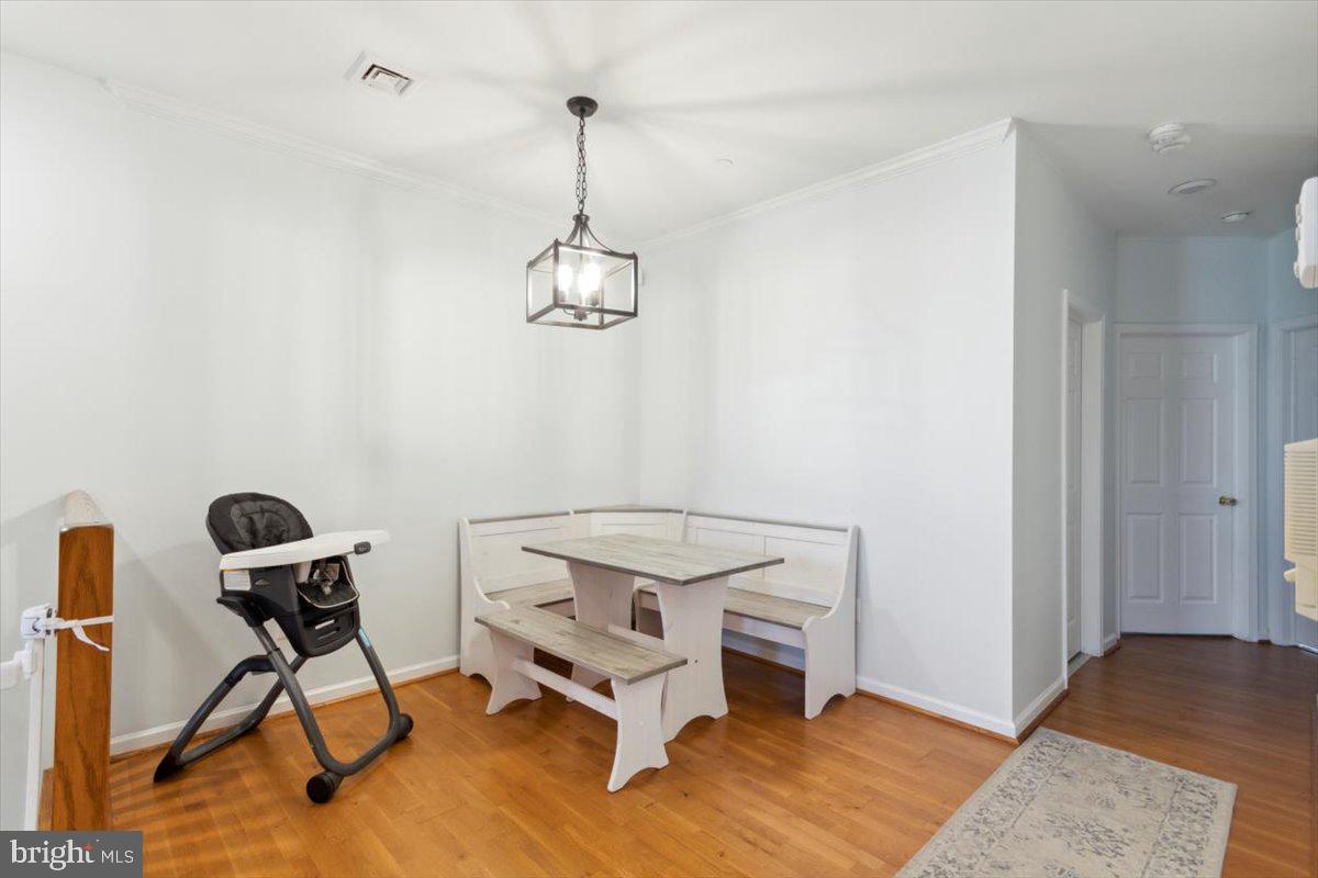 3152 Master Street, Unit 58 Philadelphia, PA 19121 - Photo 5 of 21 DR right off kitchen and down hall the 2 BRs.