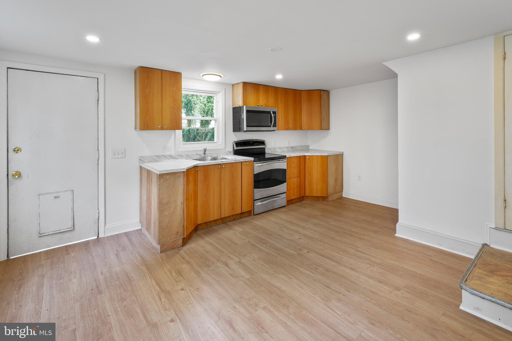 264 East Broadway Salem, NJ 08079 - Photo 15 of 51 a view of kitchen with wooden floor and electronic appliances