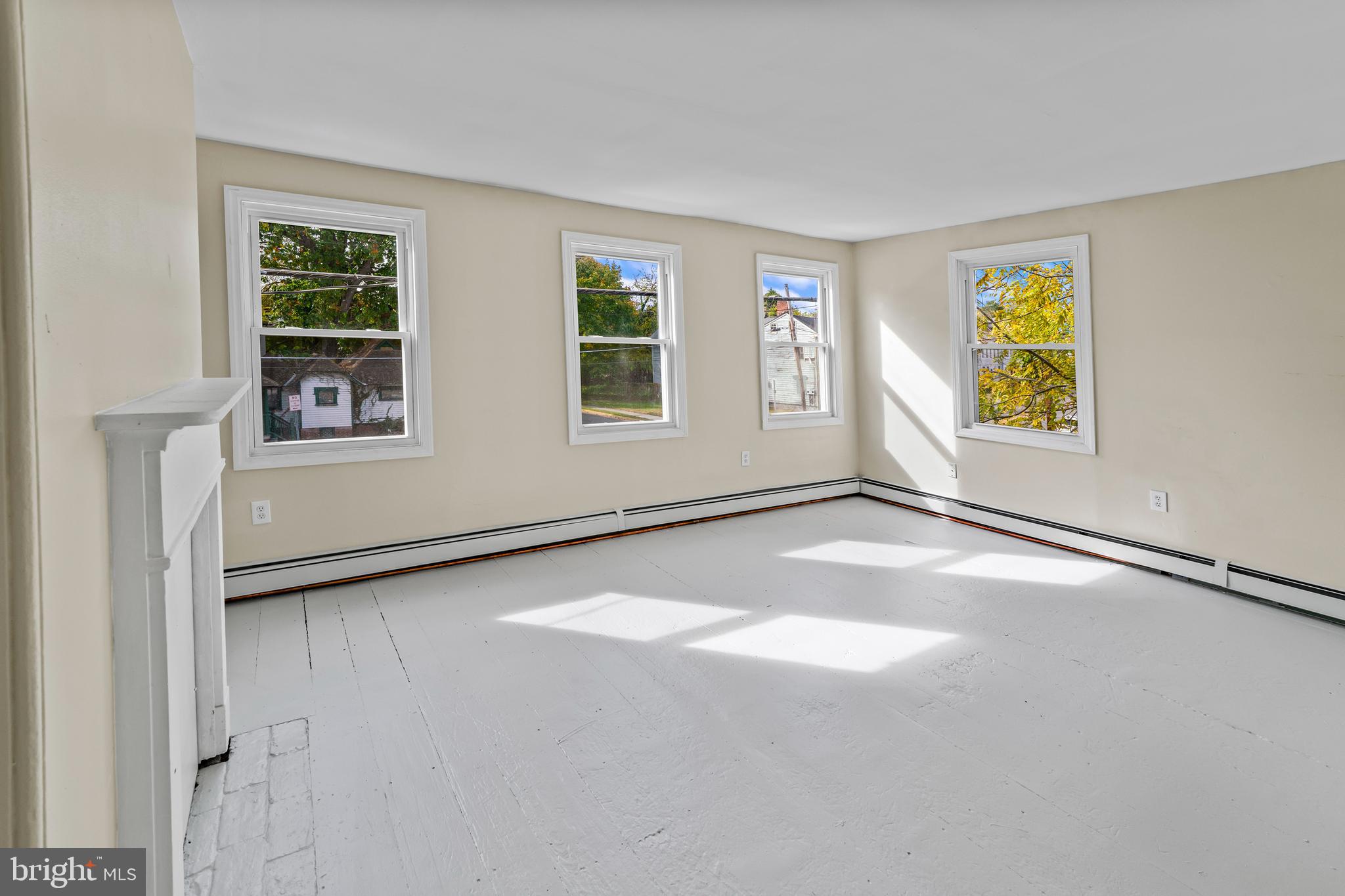 264 East Broadway Salem, NJ 08079 - Photo 23 of 51 an empty room with windows