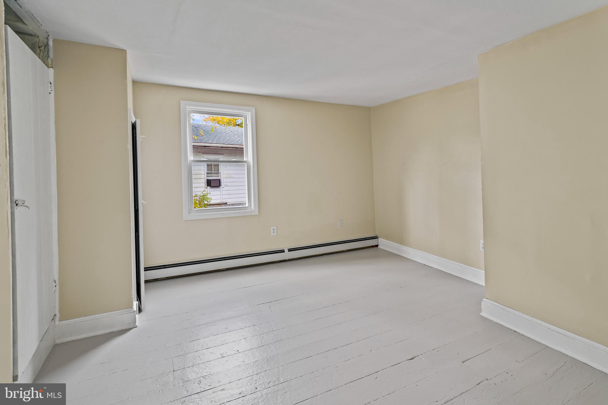 264 East Broadway Salem, NJ 08079 - Photo 28 of 51 a view of an empty room with a window