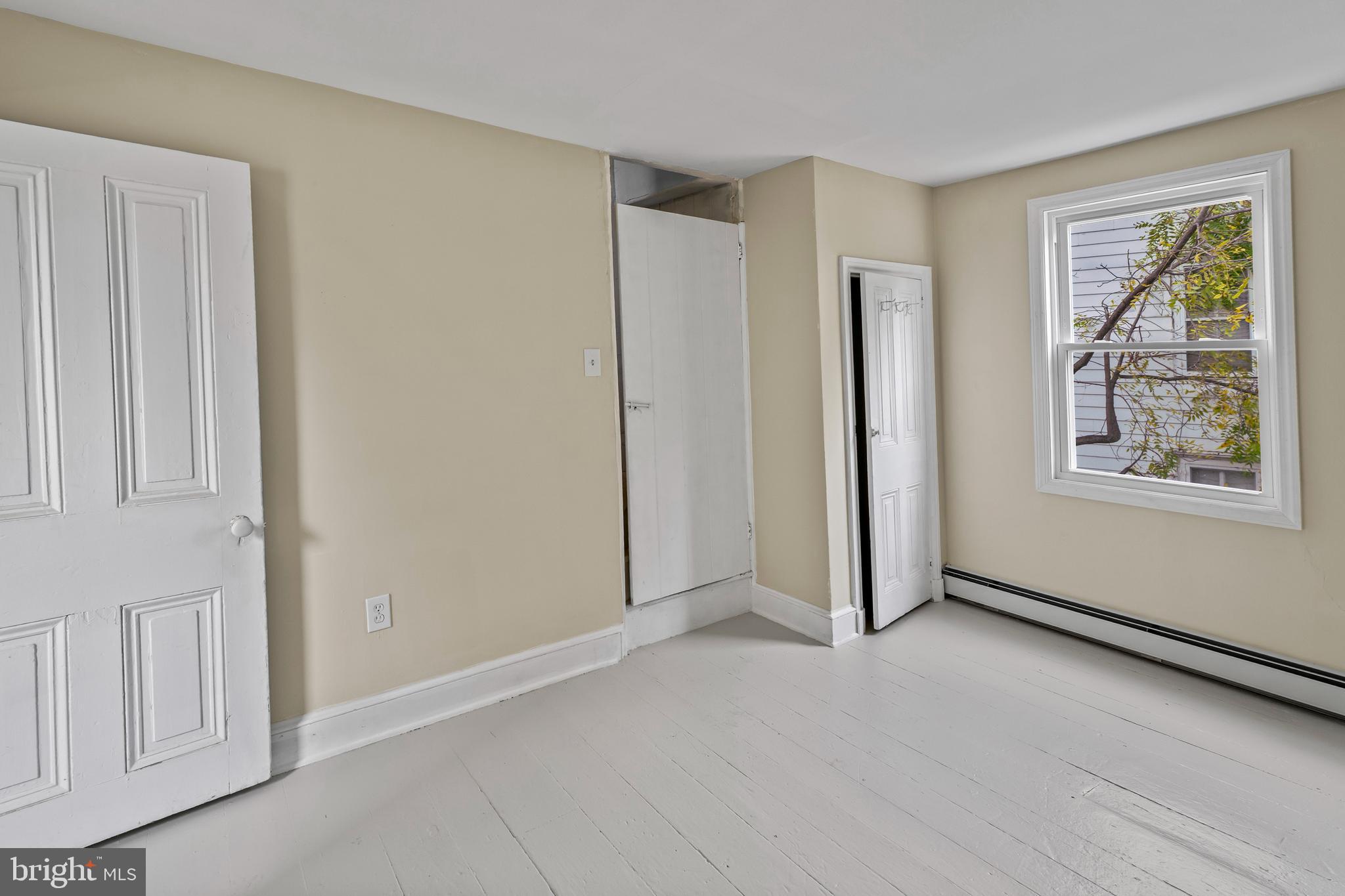 264 East Broadway Salem, NJ 08079 - Photo 29 of 51 an empty room with windows and closet