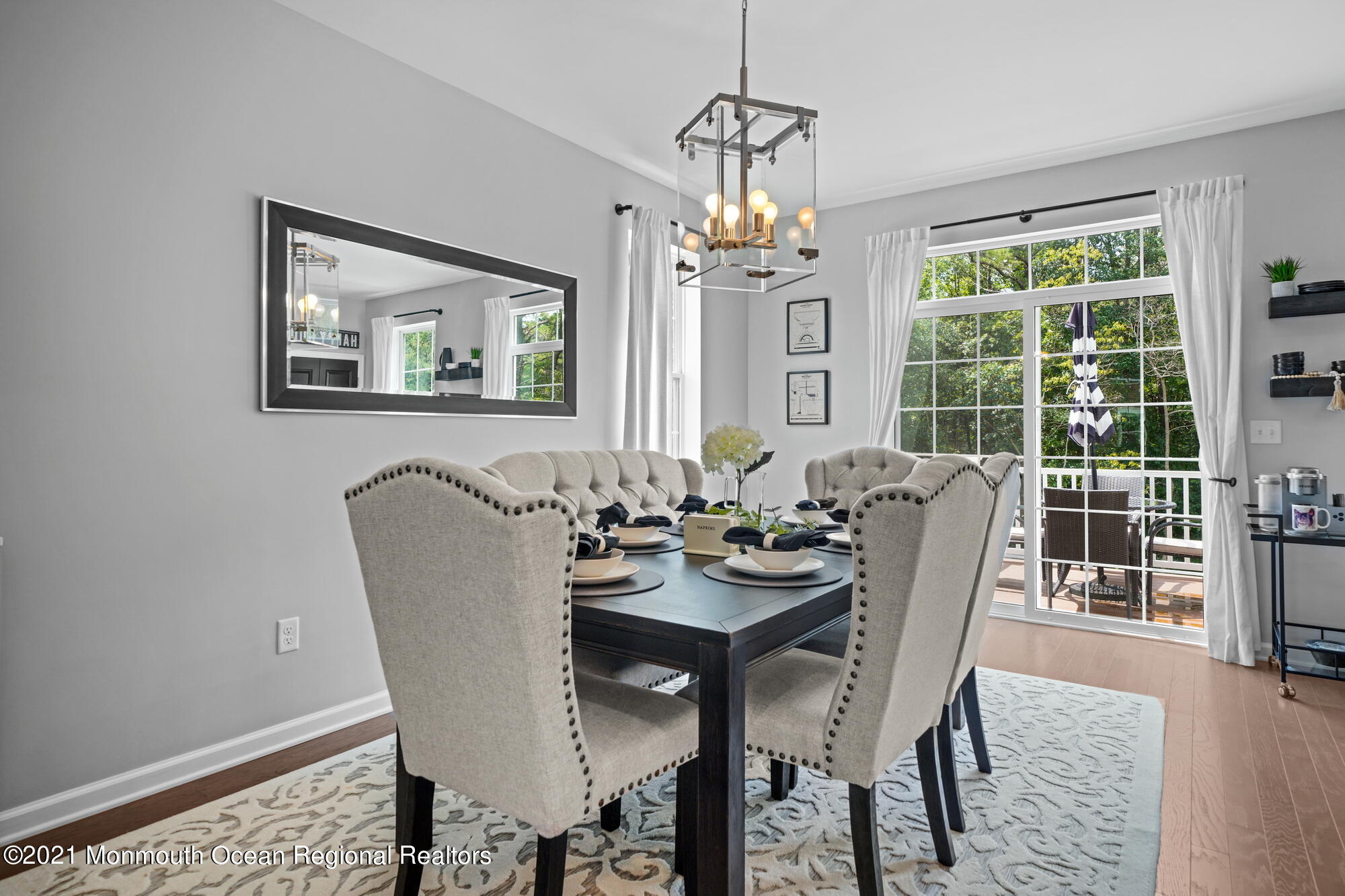 114 Revival Road Brick, NJ 08723 - Photo 22 of 44 a view of a dining room with furniture window and outside view