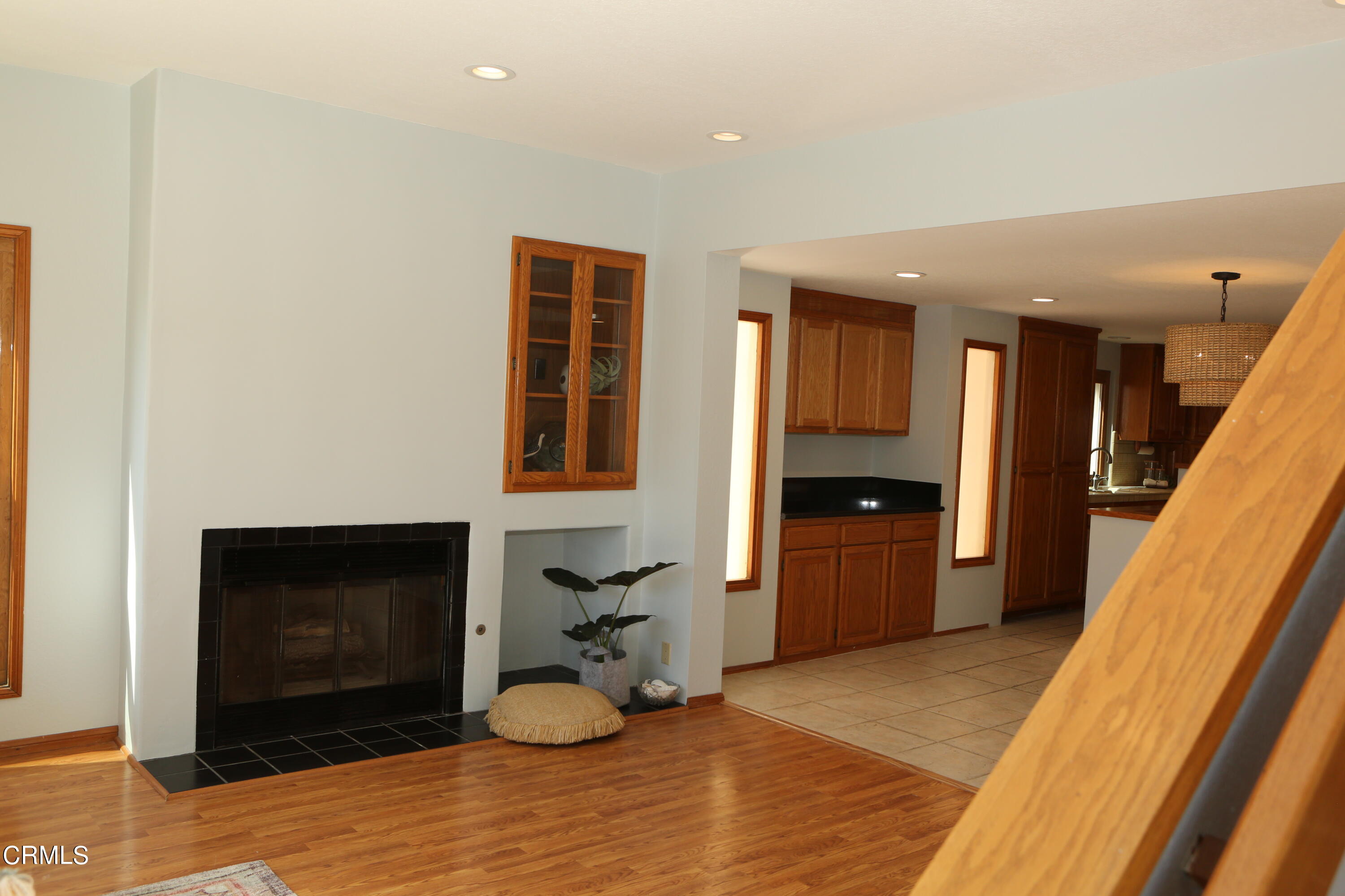 3446 Ocean Drive Oxnard, CA 93035 - Photo 12 of 37 a room with furniture and a fireplace