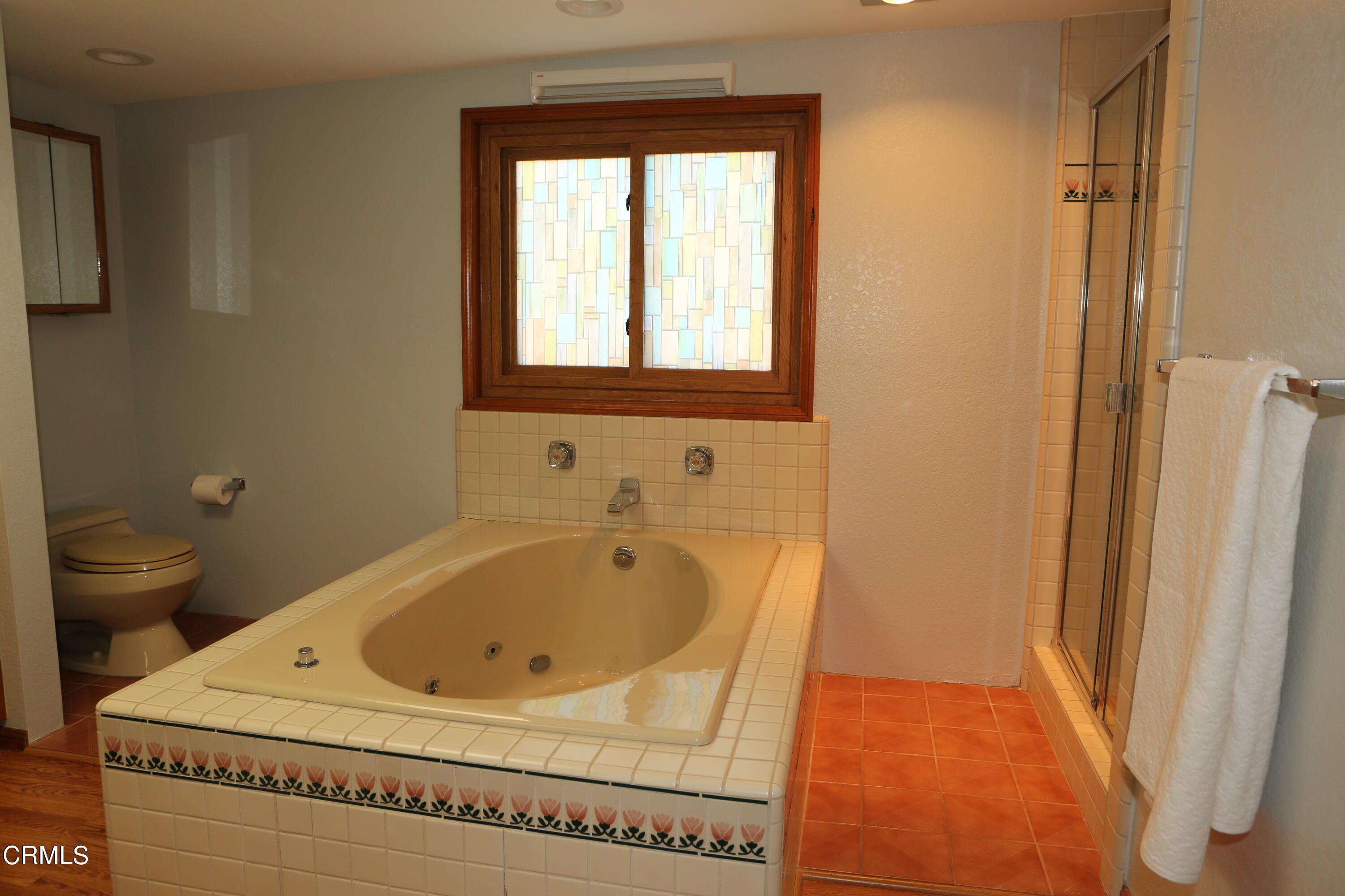 3446 Ocean Drive Oxnard, CA 93035 - Photo 19 of 37 a bathroom with a sink and a toilet