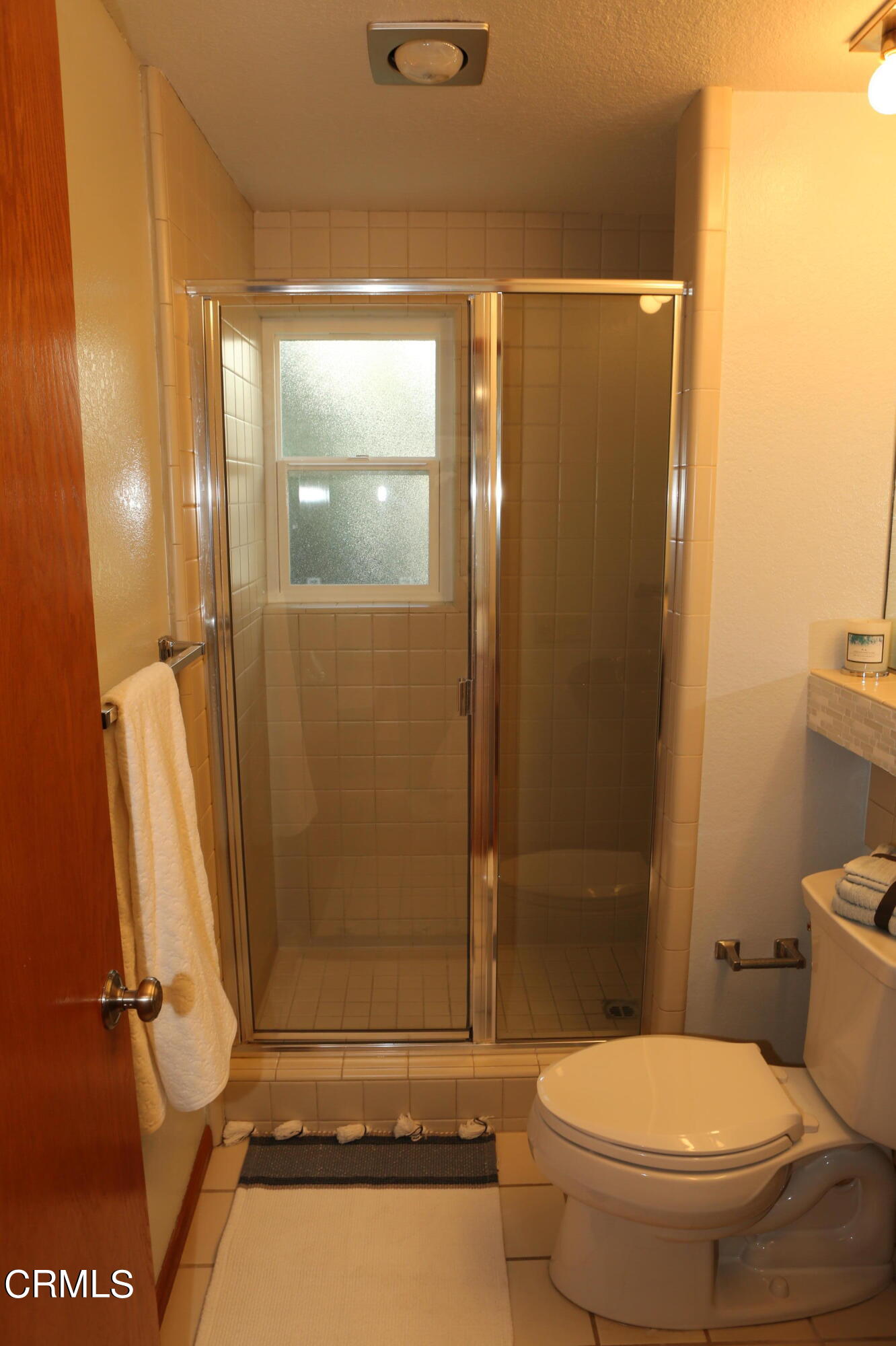 3446 Ocean Drive Oxnard, CA 93035 - Photo 31 of 37 a bathroom with a toilet and a shower
