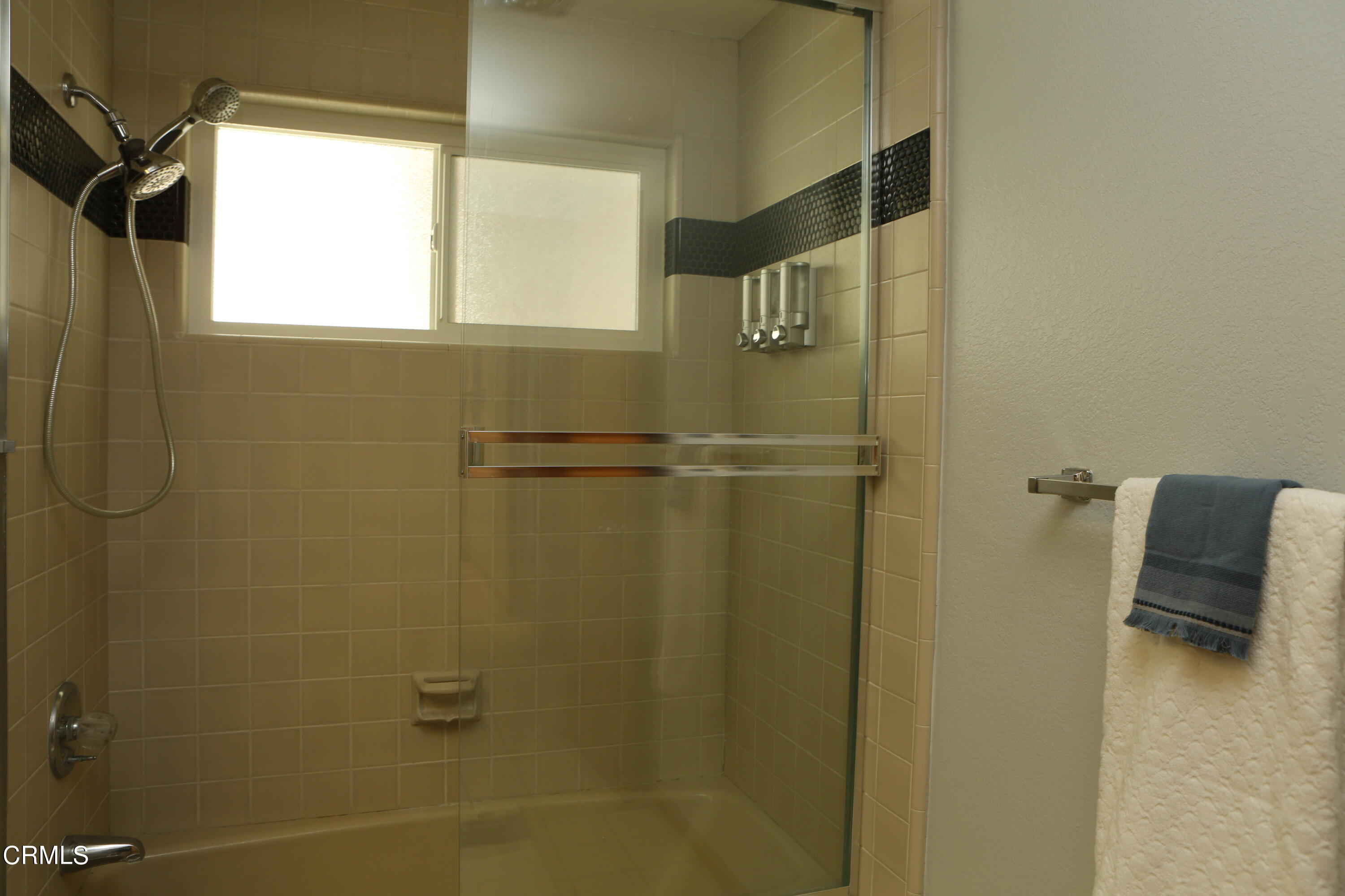 3446 Ocean Drive Oxnard, CA 93035 - Photo 32 of 37 a bathroom with a shower