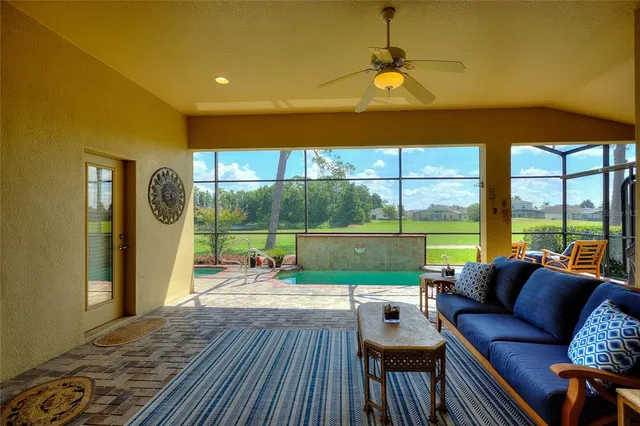 a kitchen with a table chairs stove and cabinets