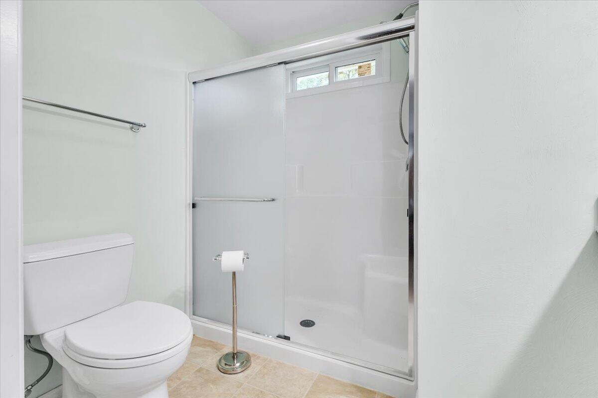 4131 Rutrough Road Southeast Roanoke, VA 24014 - Photo 16 of 42 a bathroom with a toilet and a shower
