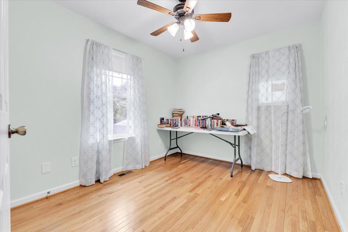 4131 Rutrough Road Southeast Roanoke, VA 24014 - Photo 20 of 42 a view of a workspace with furniture and a window