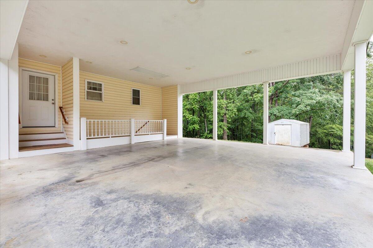 4131 Rutrough Road Southeast Roanoke, VA 24014 - Photo 9 of 42 a view of a house with backyard and floor to ceiling windows