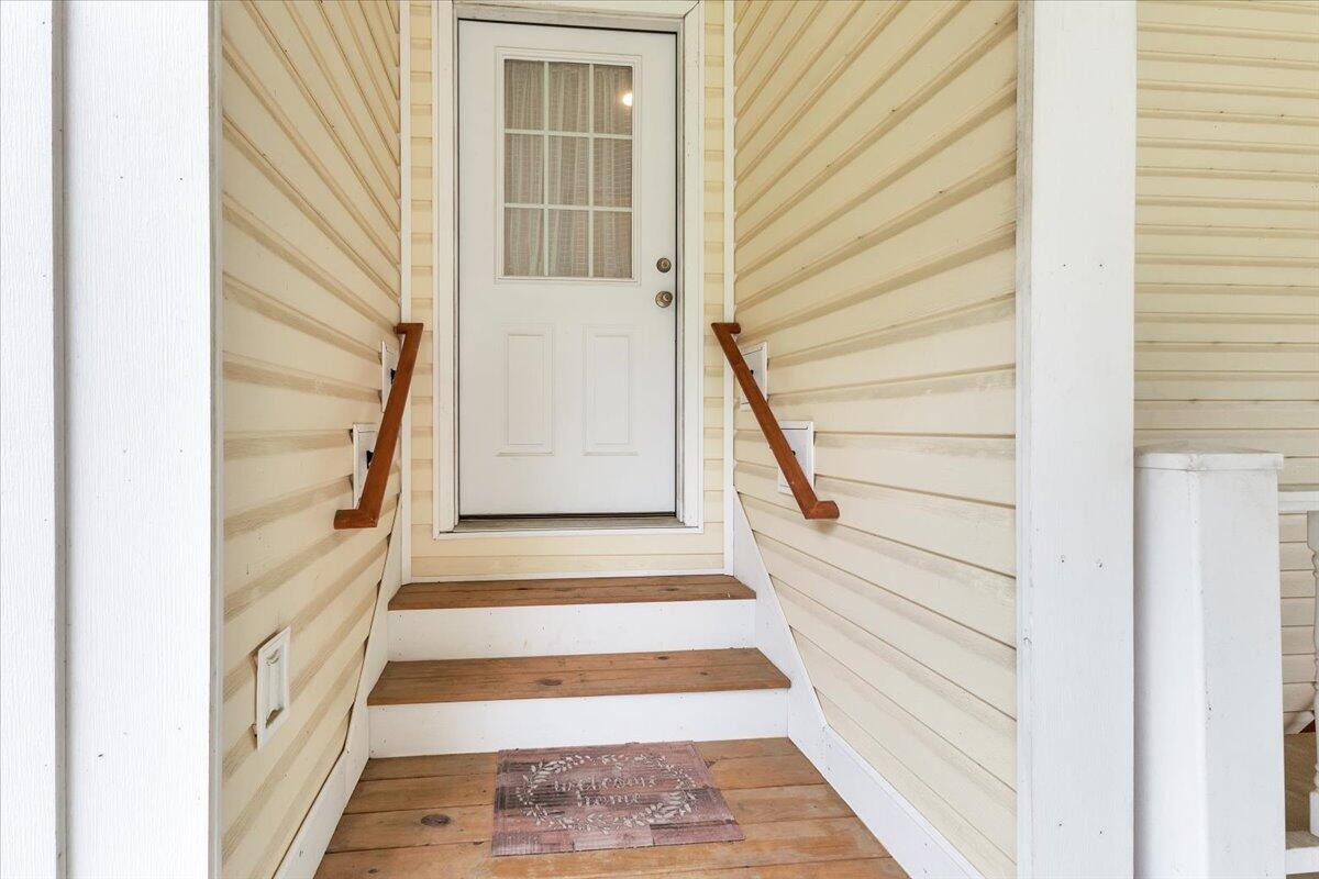 4131 Rutrough Road Southeast Roanoke, VA 24014 - Photo 10 of 42 a view of staircase with white walls and a window