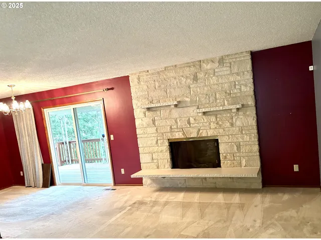 a kitchen with a stove and a microwave
