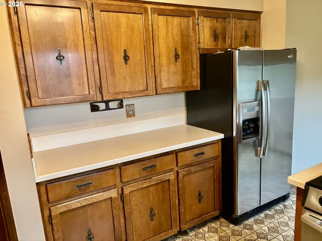 a bathroom with a window and a shower