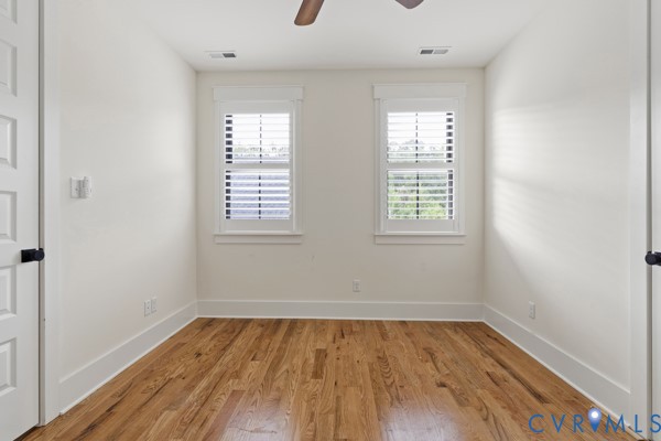 10512 River Road Chesterfield, VA 23838 - Photo 34 of 64 Hardwood flooring, white window shutters, ceiling
