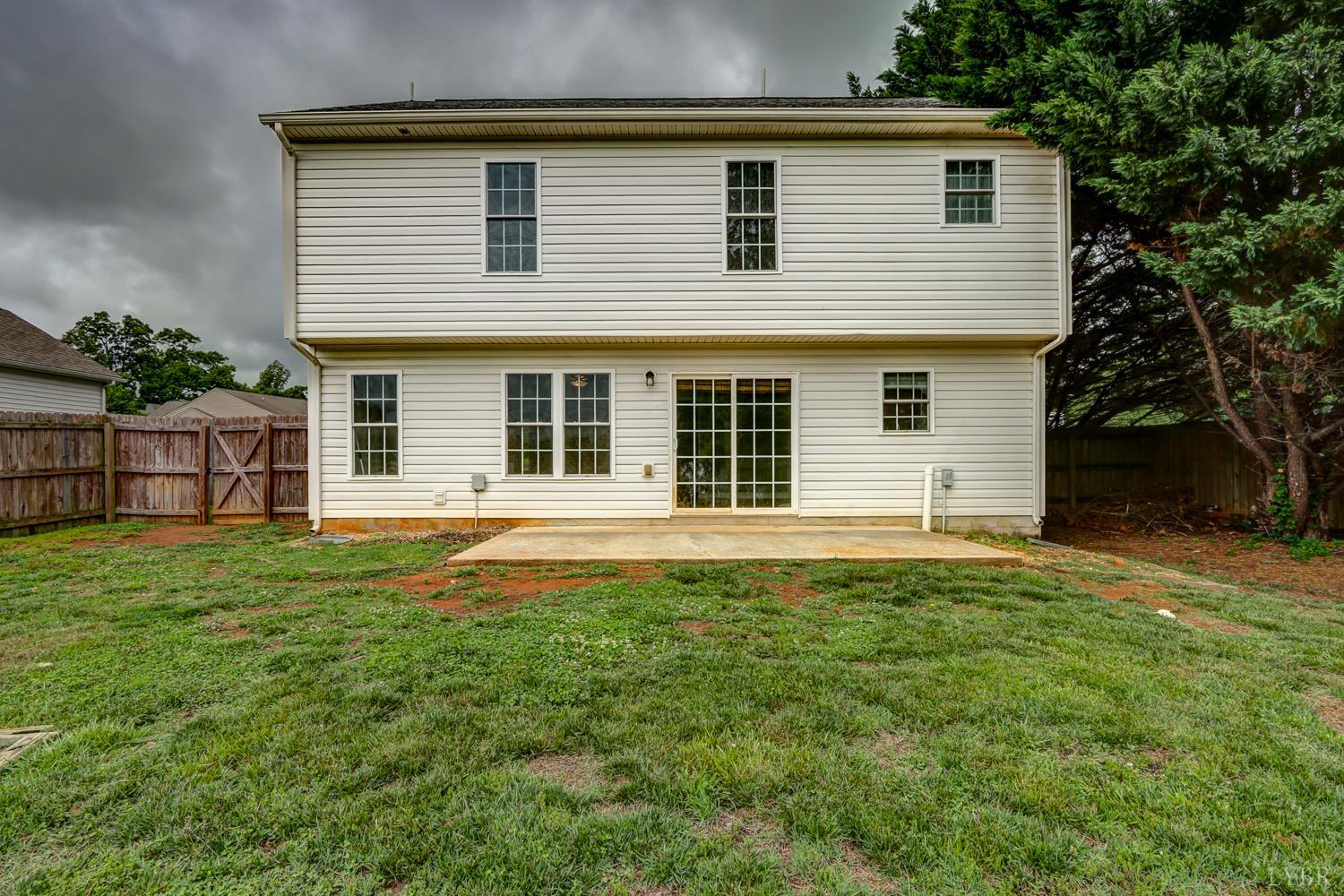 1057 Old Trail Road Forest, VA 24551 - Photo 46 of 49 a backyard of a house with large garden and plants