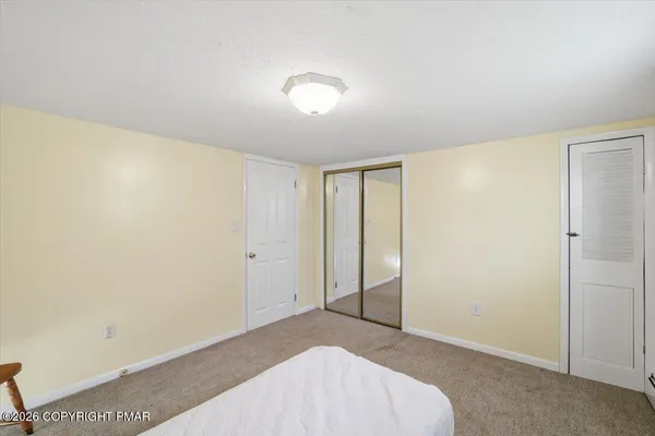 a workspace with furniture and window