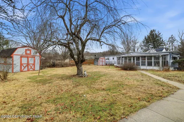 a view of a porch with furniture