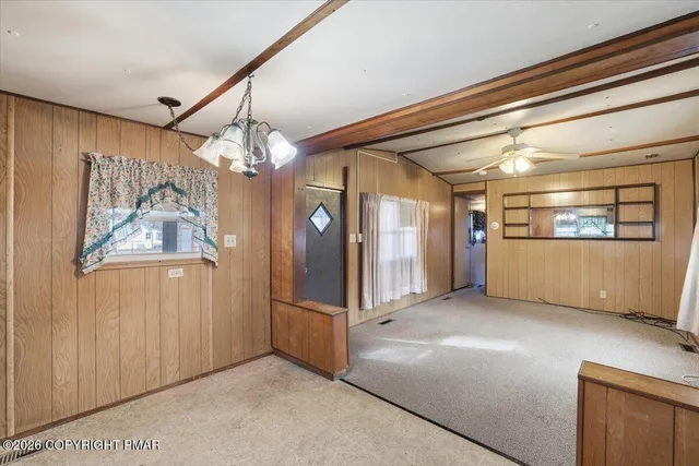 a kitchen with stainless steel appliances granite countertop a refrigerator sink and cabinets