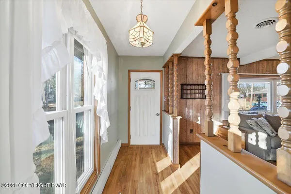 a view of a living room and entry way
